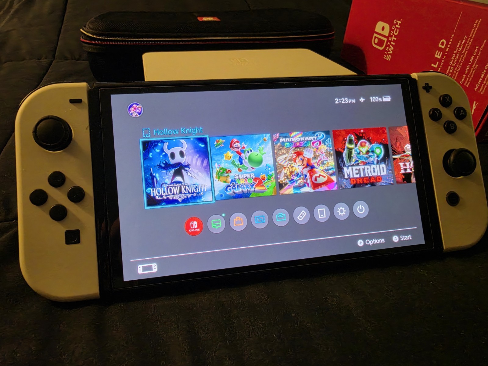 Nintendo Switch OLED Model – 64GB – White with case and SD card.