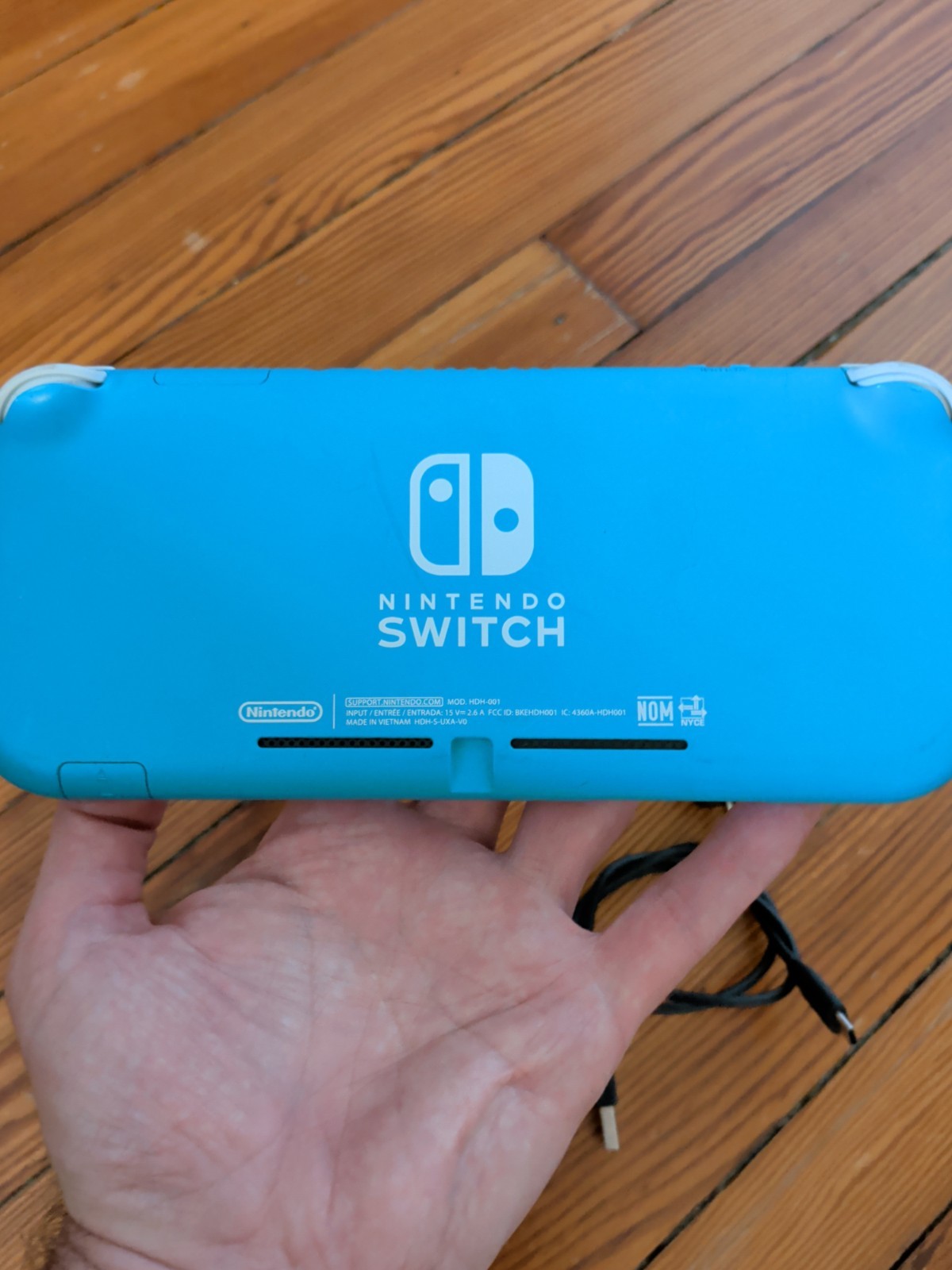 Nintendo Switch Lite Turquoise 32GB Console; Charger & Mario Odyssey Game – Fair