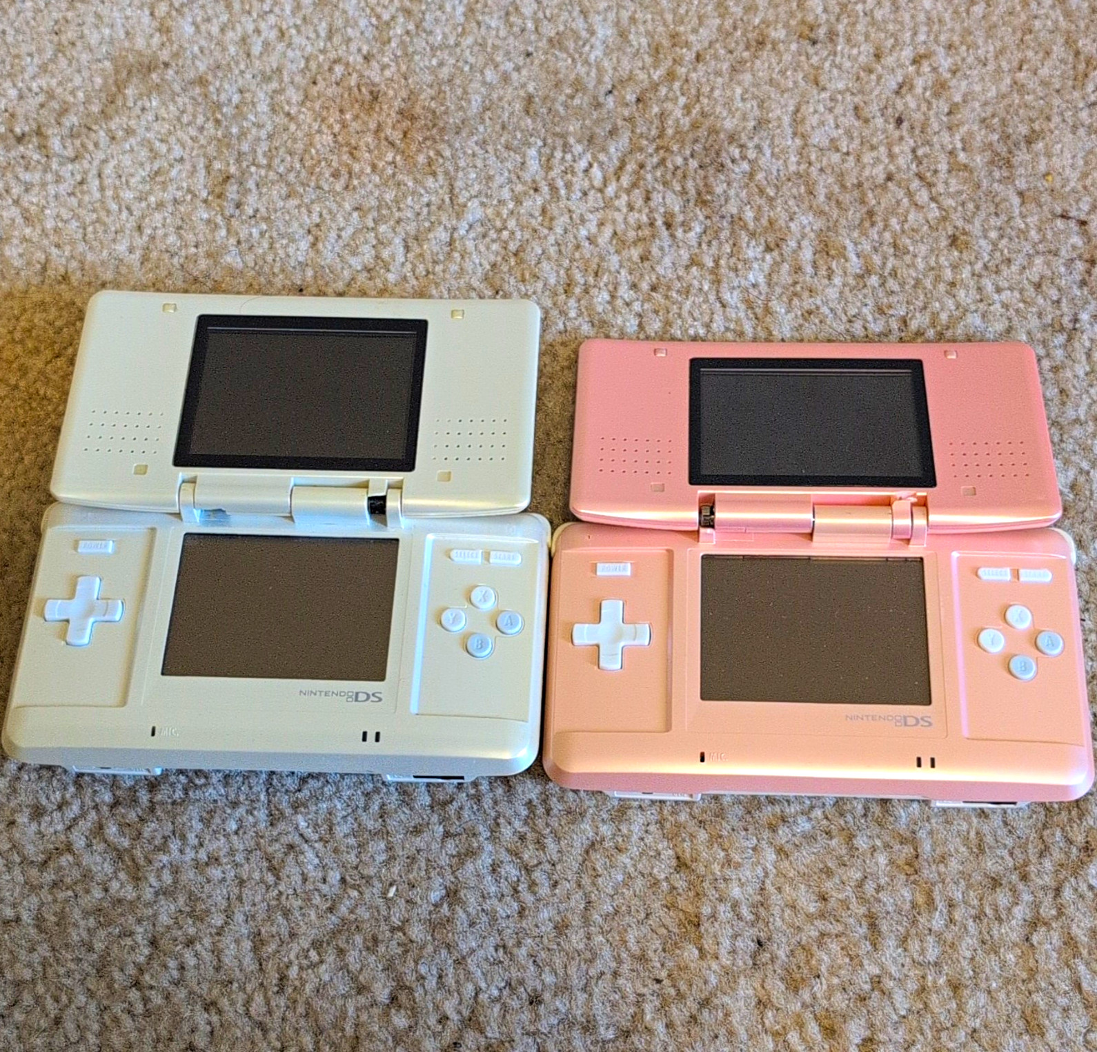 Lot Of 2 Nintendo DS White And Pink ,BROKEN HINGES NO CHARGER, TESTED AND WORKS.