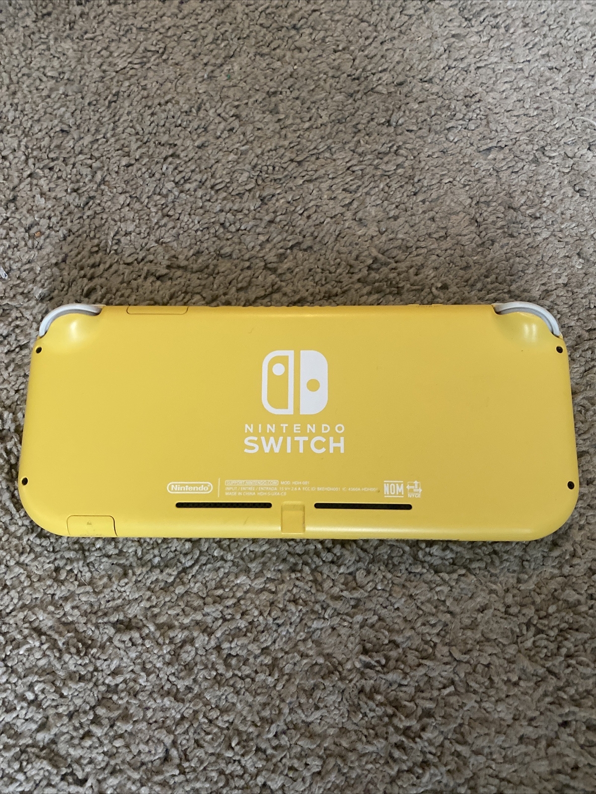 Nintendo Switch Lite Yellow Console /w small scratch