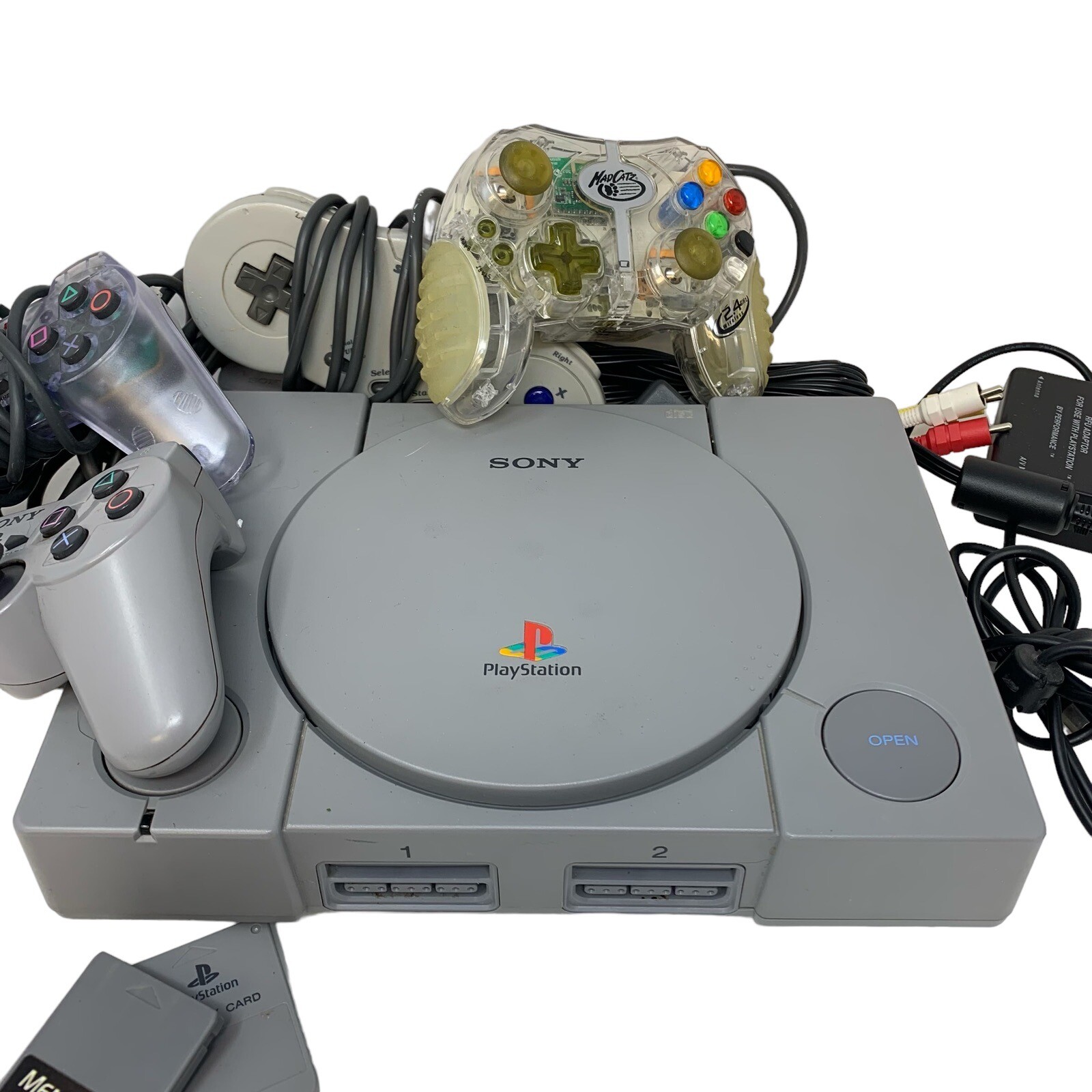 PlayStation System PS1 Bundle Cords 4 DualShock Controllers 2 Memory Cards