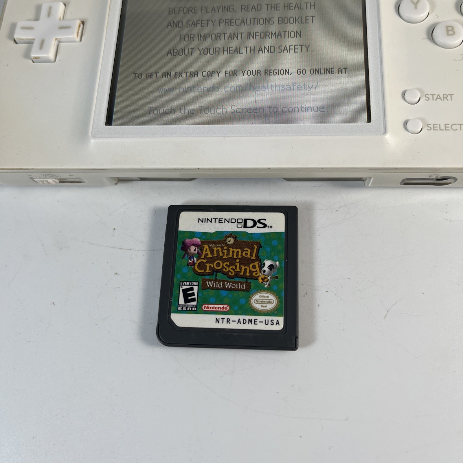 Nintendo DS Lite White Handheld System w/ animal crossing wild world