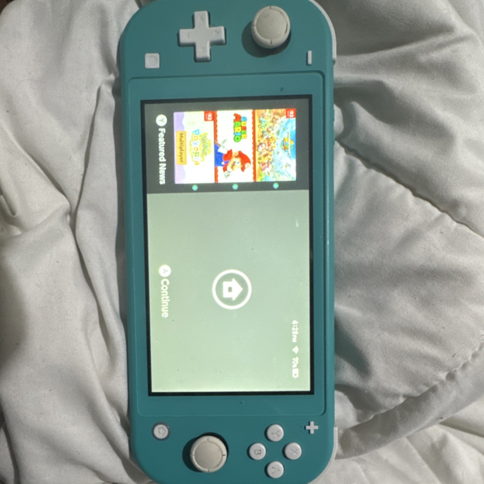 Nintendo Switch Lite Turquoise Handheld Console Wi-Fi Headphone Jack