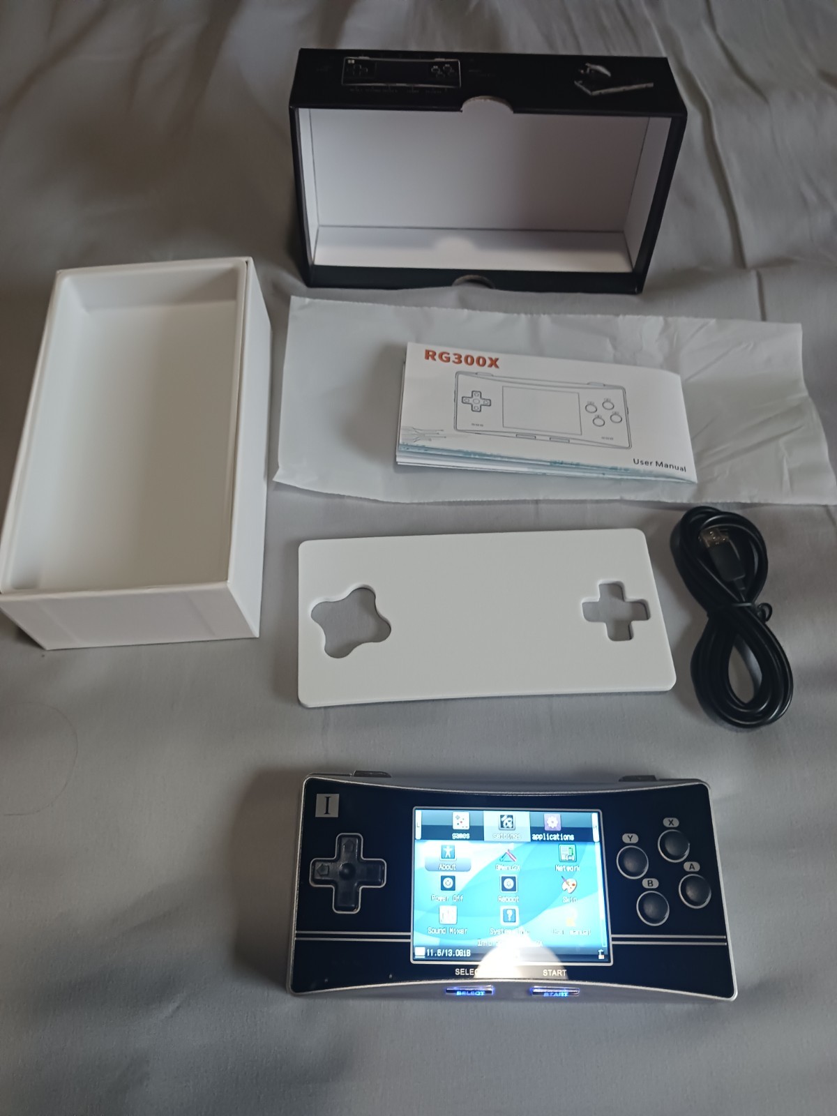 Anbernic RG 300x micro style console w original os 64GB & 16GB cards