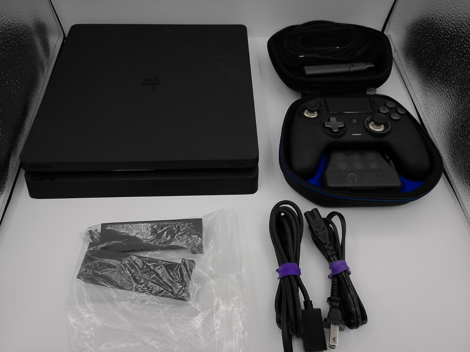 Sony PlayStation 4 Slim 500GB Black 1 controller nacon pro 16 games ;wall mount