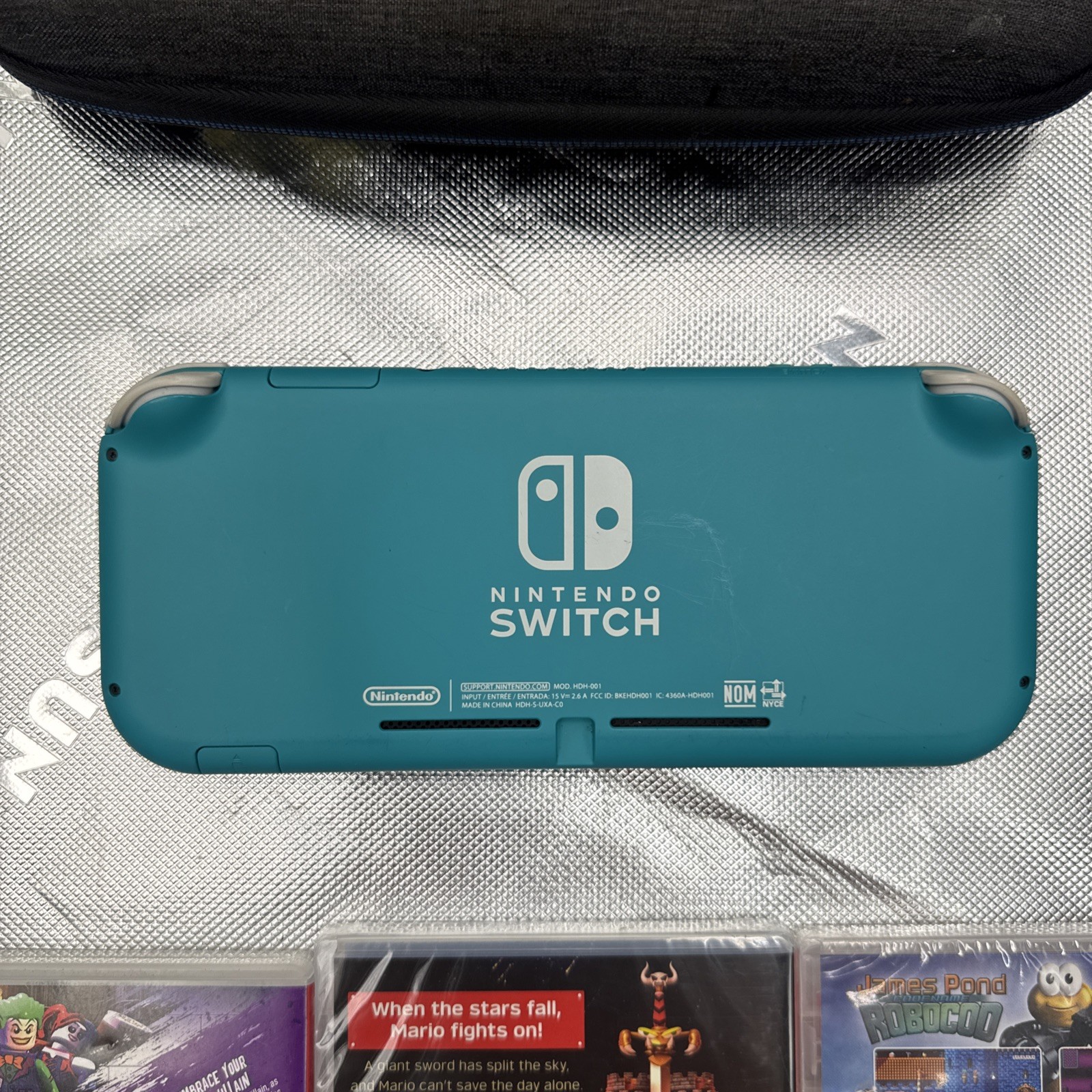 Nintendo Switch Lite 32GB Turquoise Handheld Gaming Console W/3 Games Mario Case