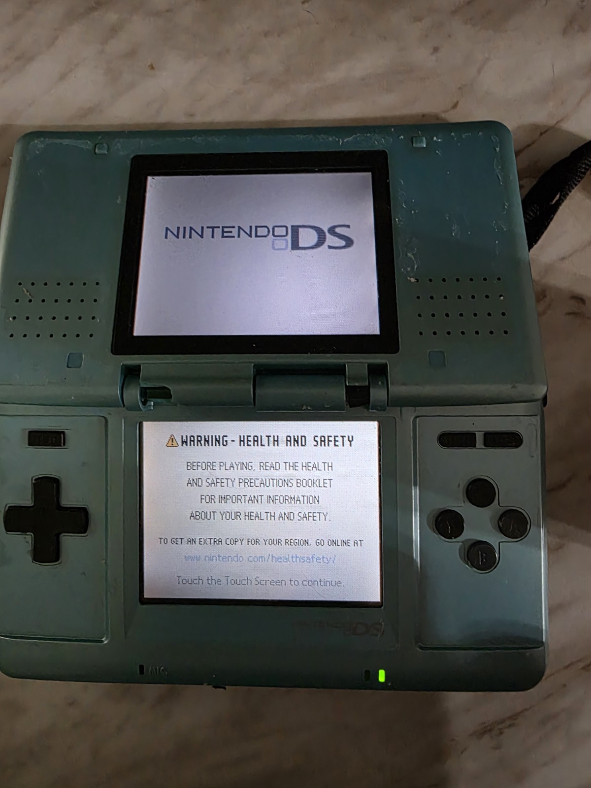 Original Nintendo DS Handheld System Blue tested working Loose Hinge