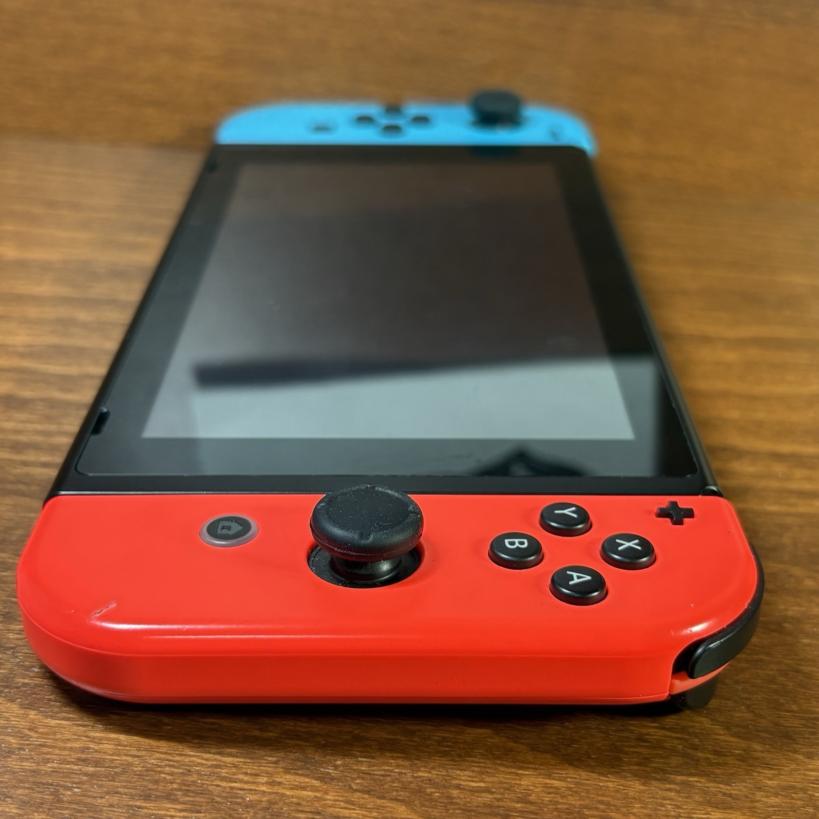 Nintendo Switch with Neon Blue & Neon Red Joy-Con | Works Perfectly | Case Inclu