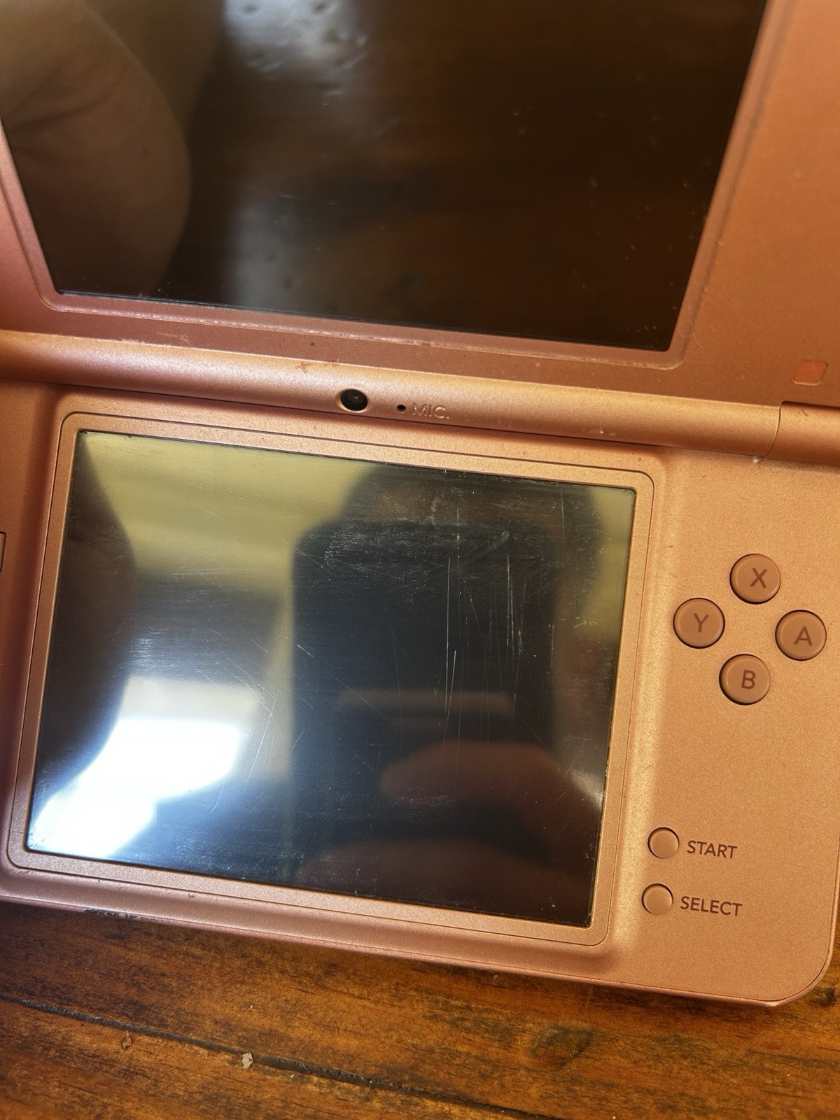 Nintendo DSi XL Metallic Rose Handheld System (No charger, pen or accessories)
