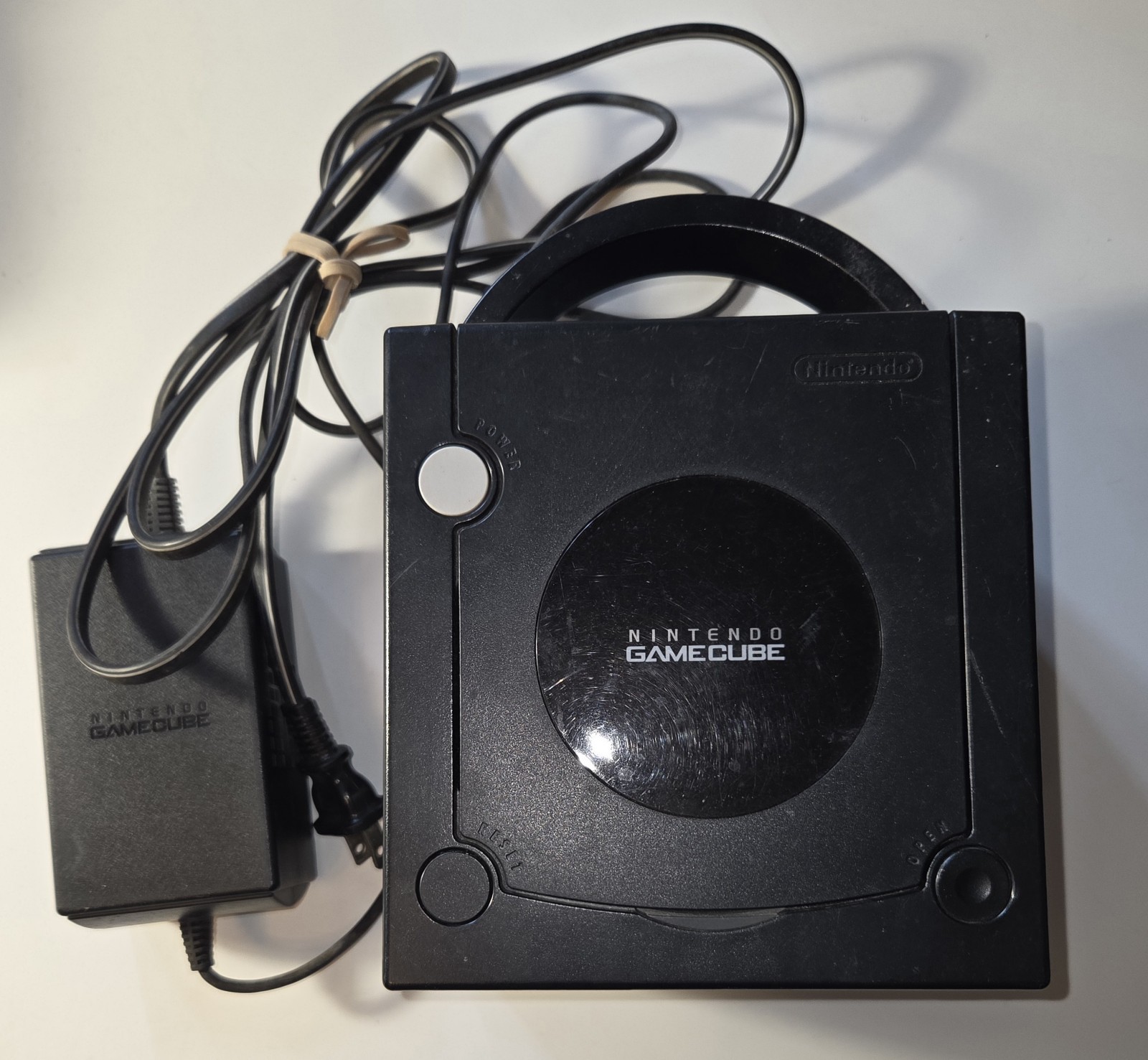 Nintendo GameCube Jet Black Console w/ Power Cable Only Turns On Spins Game