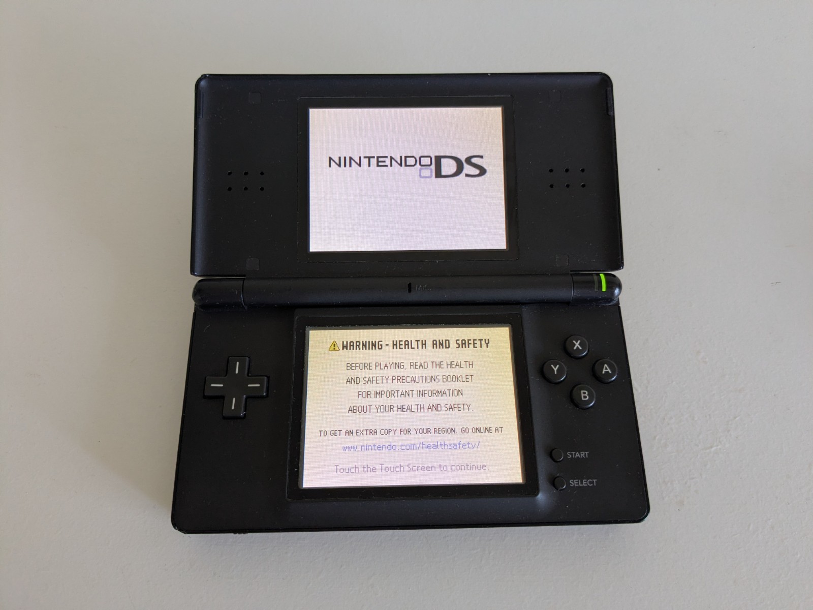 Nintendo DS Lite Black, with Charger (NO stylus) + Lot Of 28 Games – Used, Good