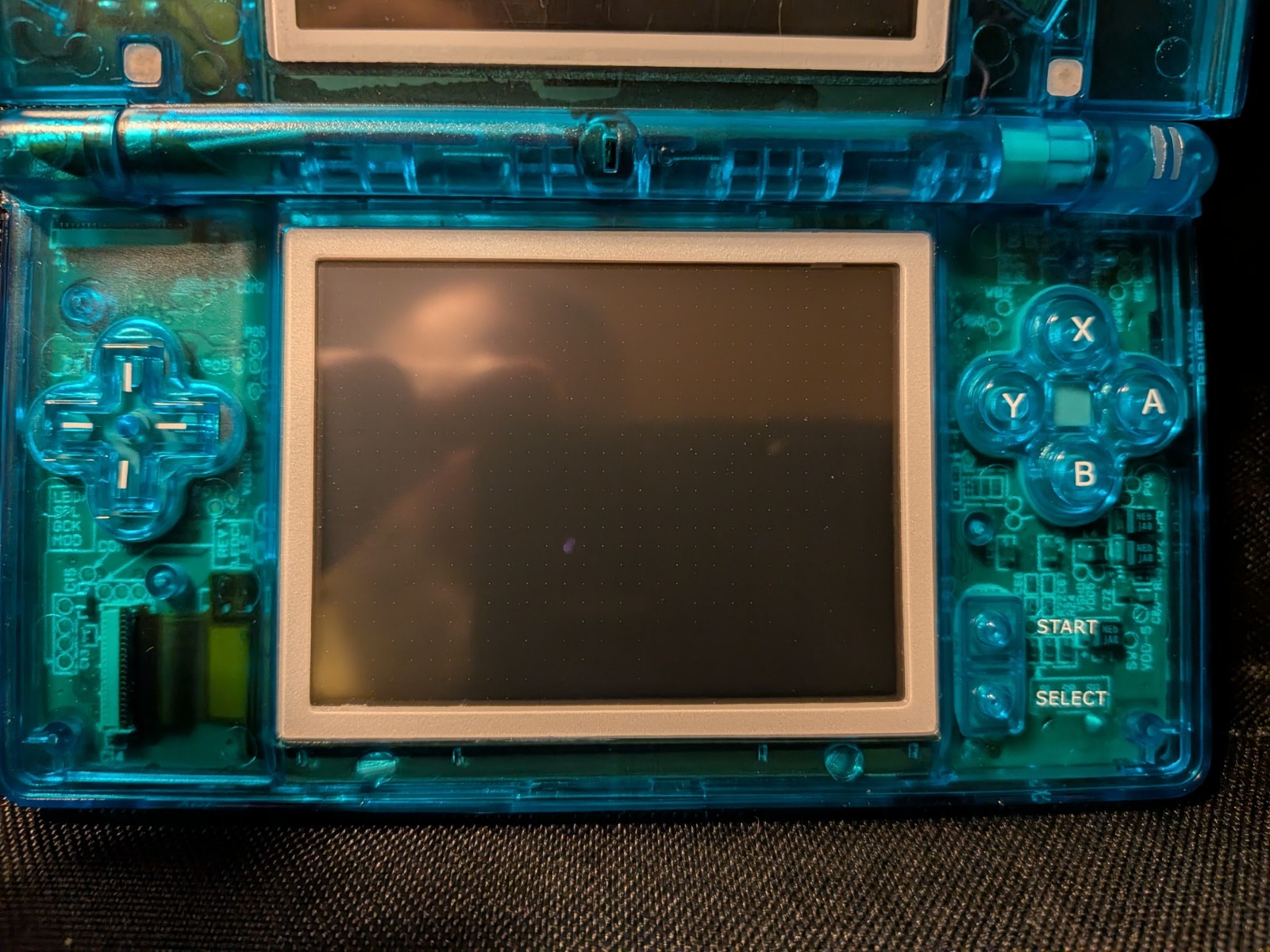 Nintendo DS Lite Transparent Blue Handheld Console with 500-in-1 Game Cartridge