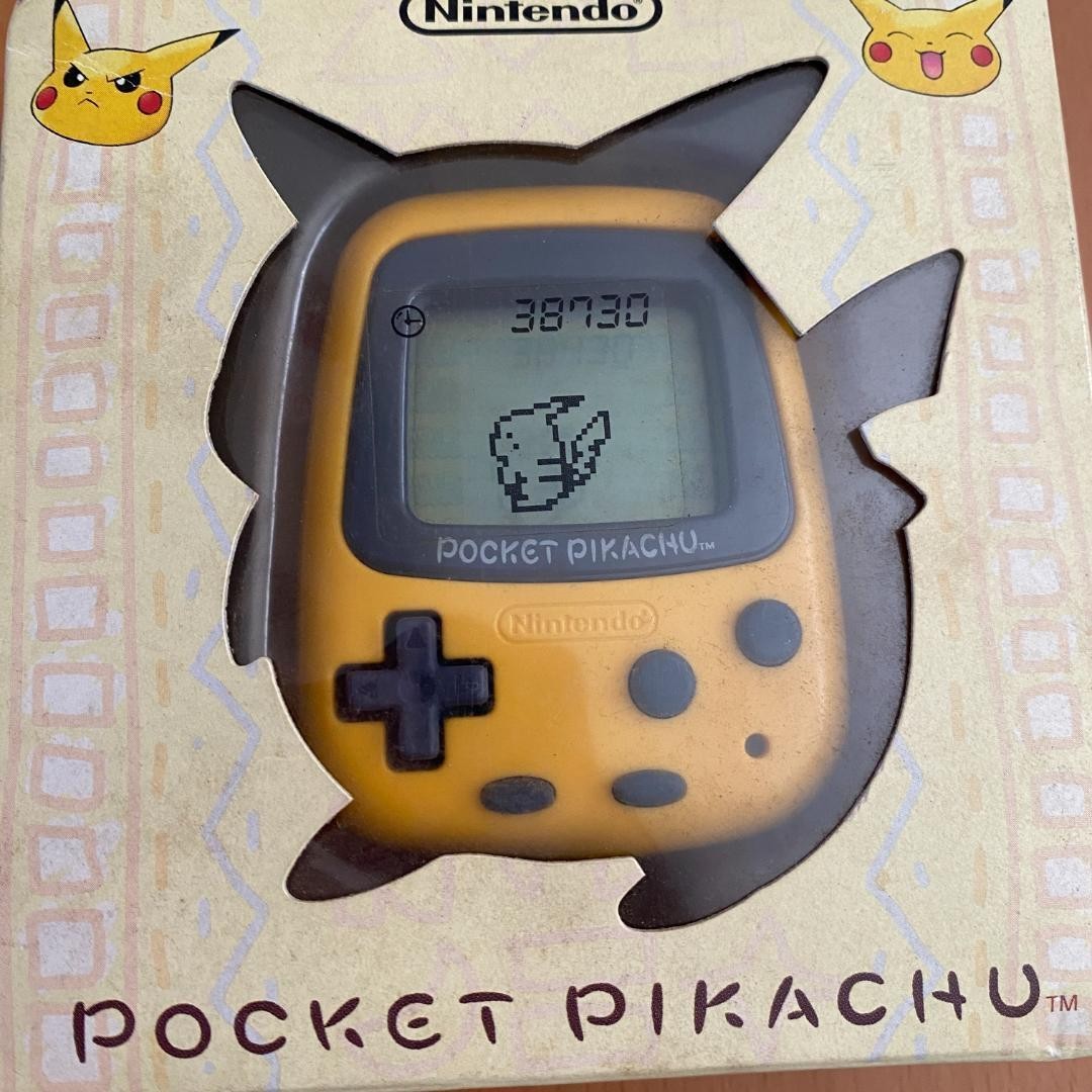 Vintage Nintendo Pocket Pikachu Yellow Pedometer Virtual Pet Game Toy Manual