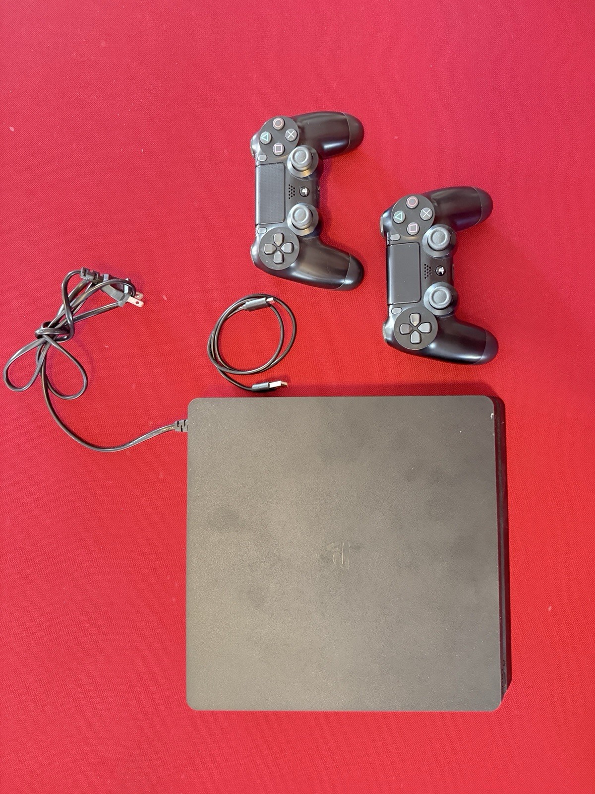 Sony PlayStation 4 Console with 2 Wireless Controllers, charging cable included