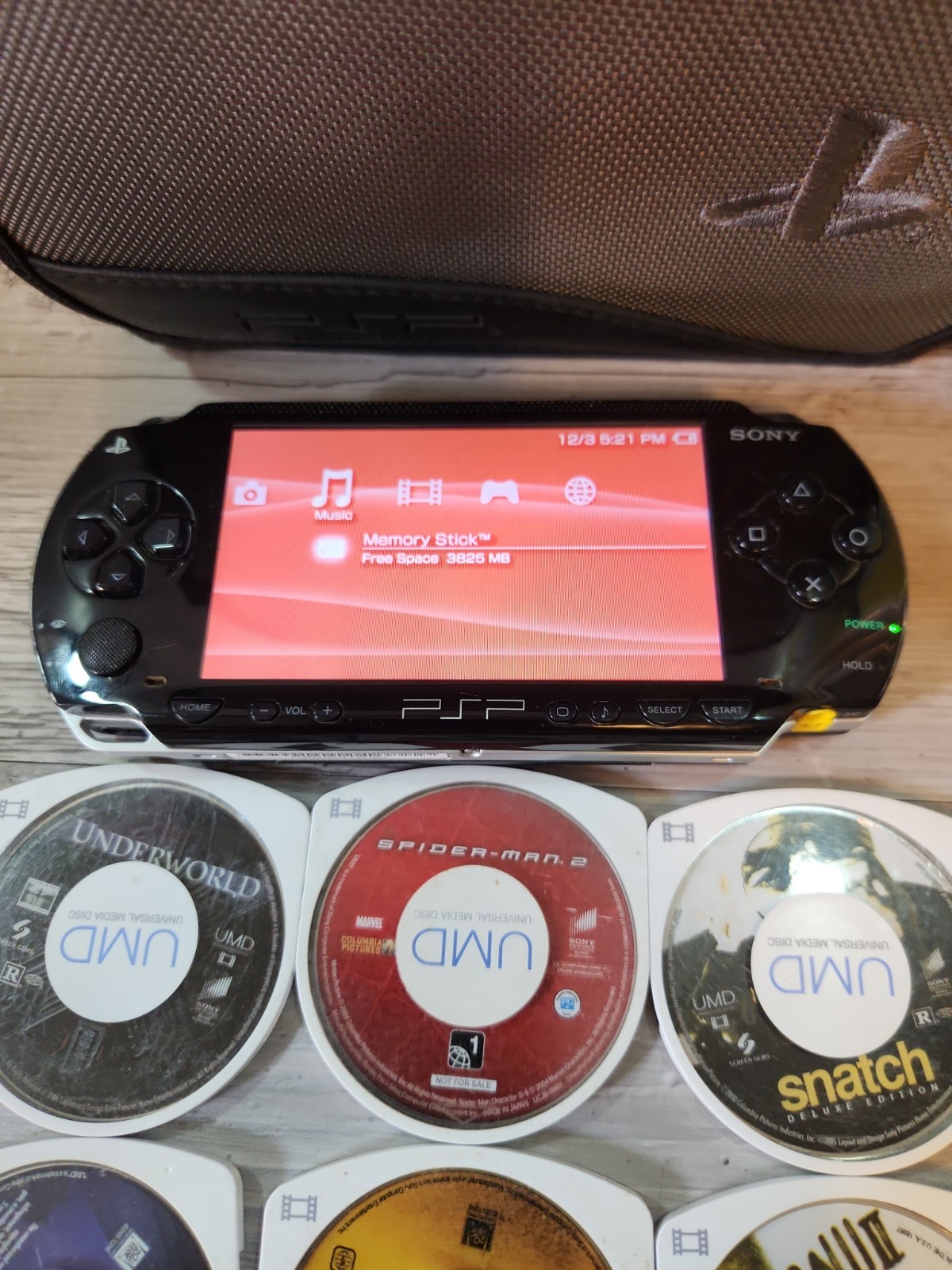 Sony PSP 1001 Handheld Console With Games Movies Cases Charger 4gb Memory