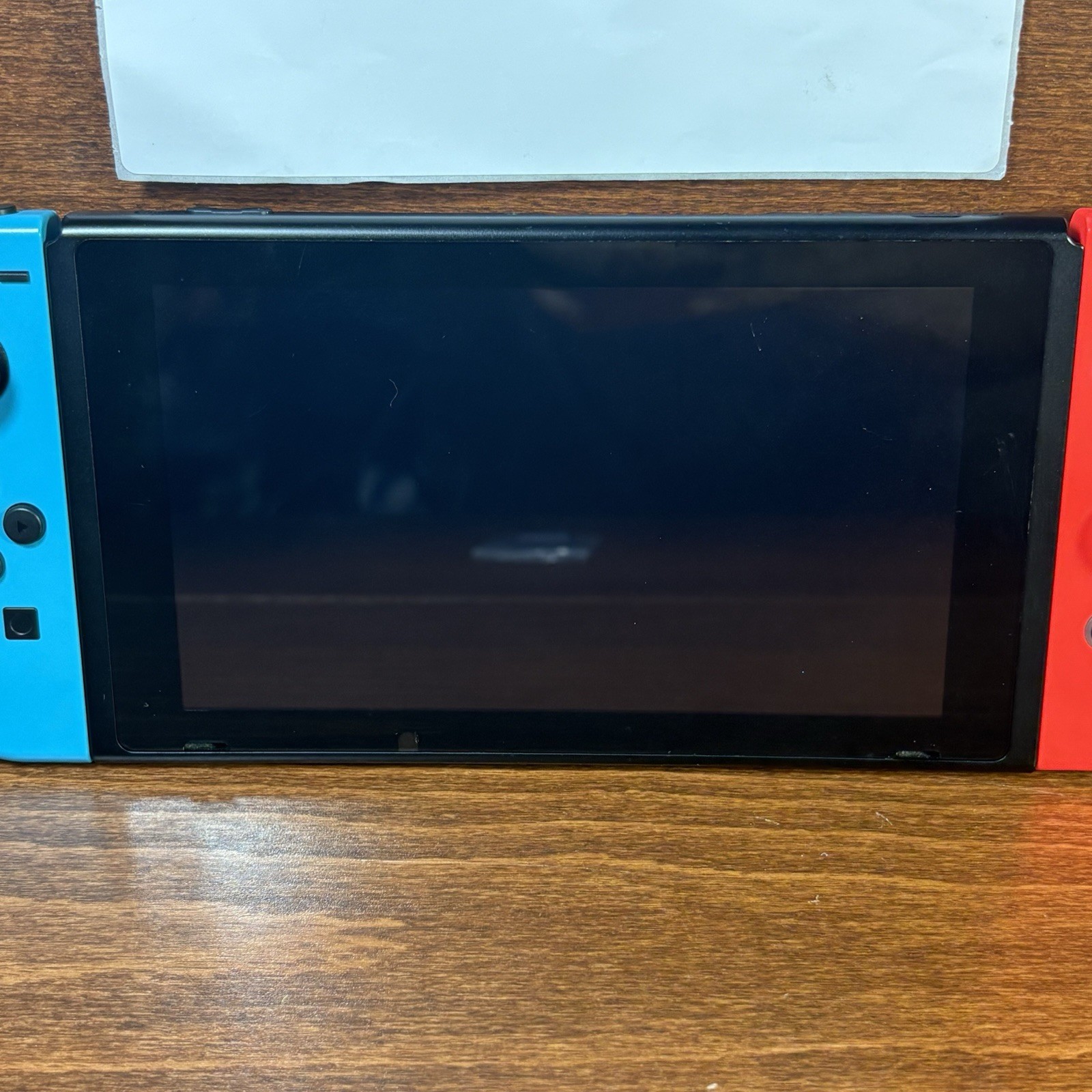 Nintendo Switch with Neon Blue & Neon Red Joy-Con | Works Perfectly | Case Inclu