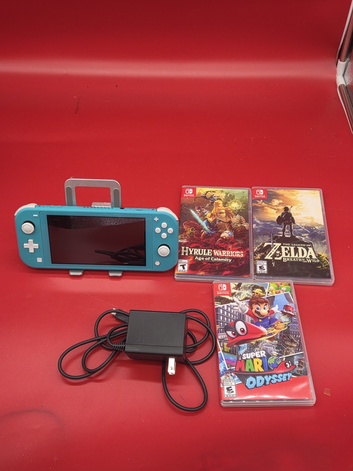 Nintendo Switch Lite Turquoise Bundle Zelda BOTW Mario Odyssey Hyrule Warriors