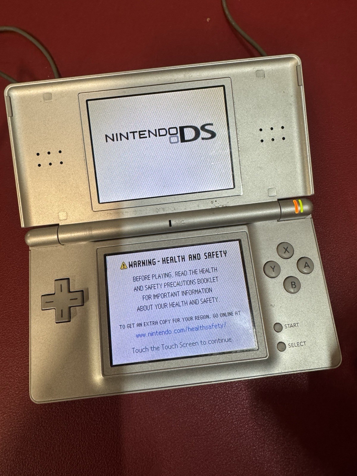 Nintendo DS Lite Console USG-001 with charger Gloss Silver 2 Games