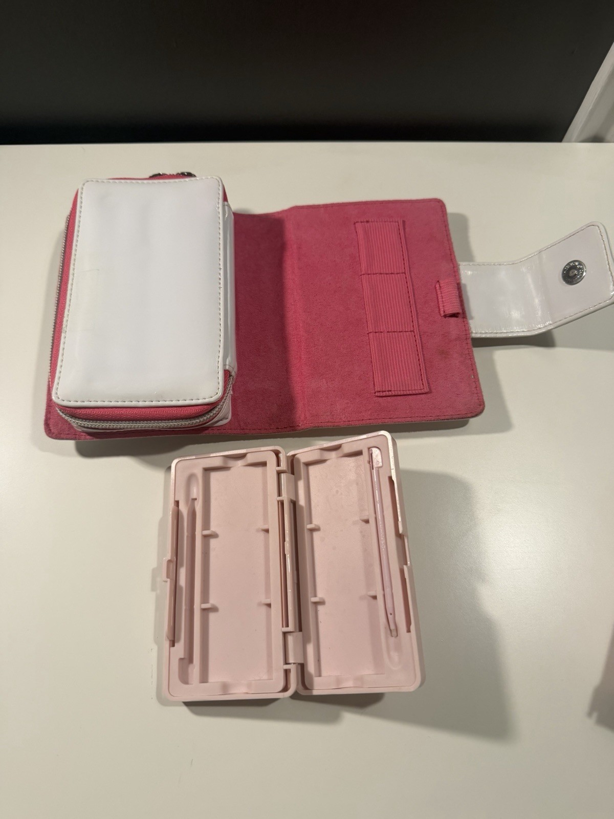 Nintendo DS Lite Metallic Rose System With Charger, Original Box, And 2 Cases