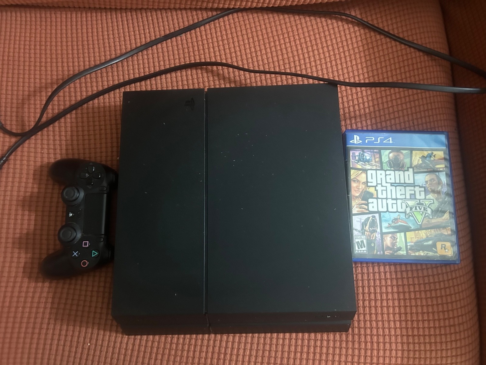 Sony PlayStation 4 500GB Jet Black Console and GTA 5