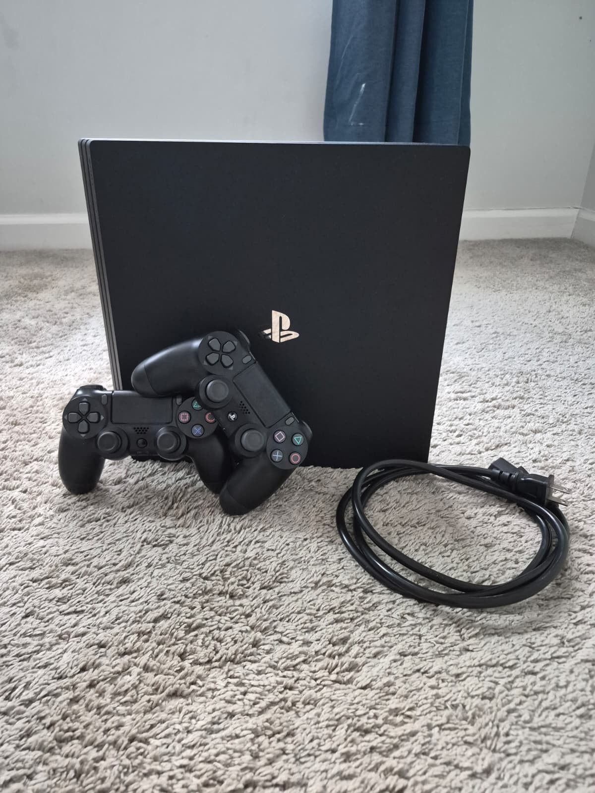 PS4 Pro 1TB with 2 DualShock controllers great condition