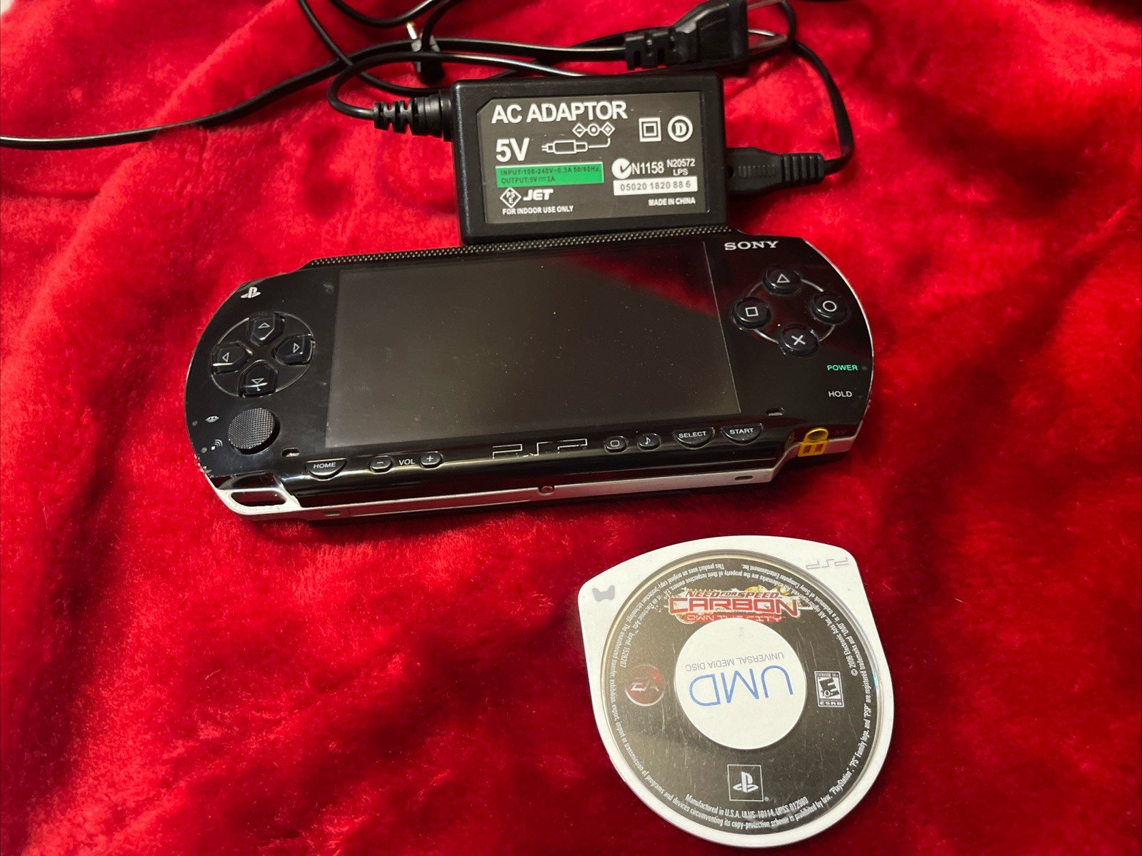 Sony PSP-1001 Black Handheld System NTSC-U/C UMD Compatible AC Adapter + UMD
