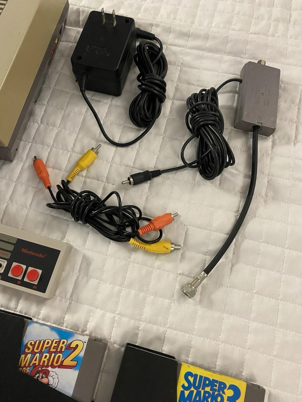 authentic NES Console Bundle with Super Mario Bros. 1,2,3 and 2 Controllers gun