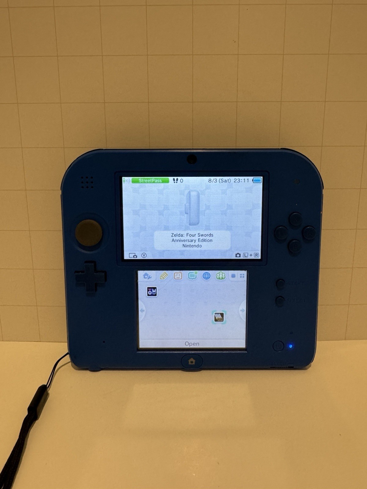Nintendo 2DS Blue Handheld Console W/ Zelda: Four Swords