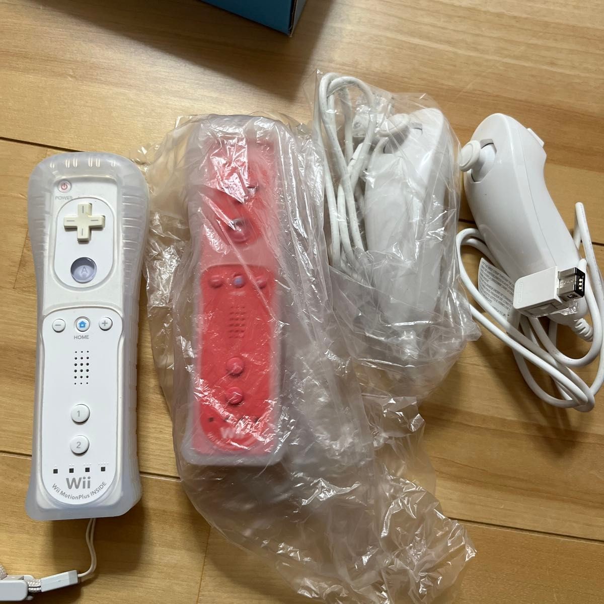 Nintendo Wii console with Wii Party bundle, Nunchuk included, and 3 other games.