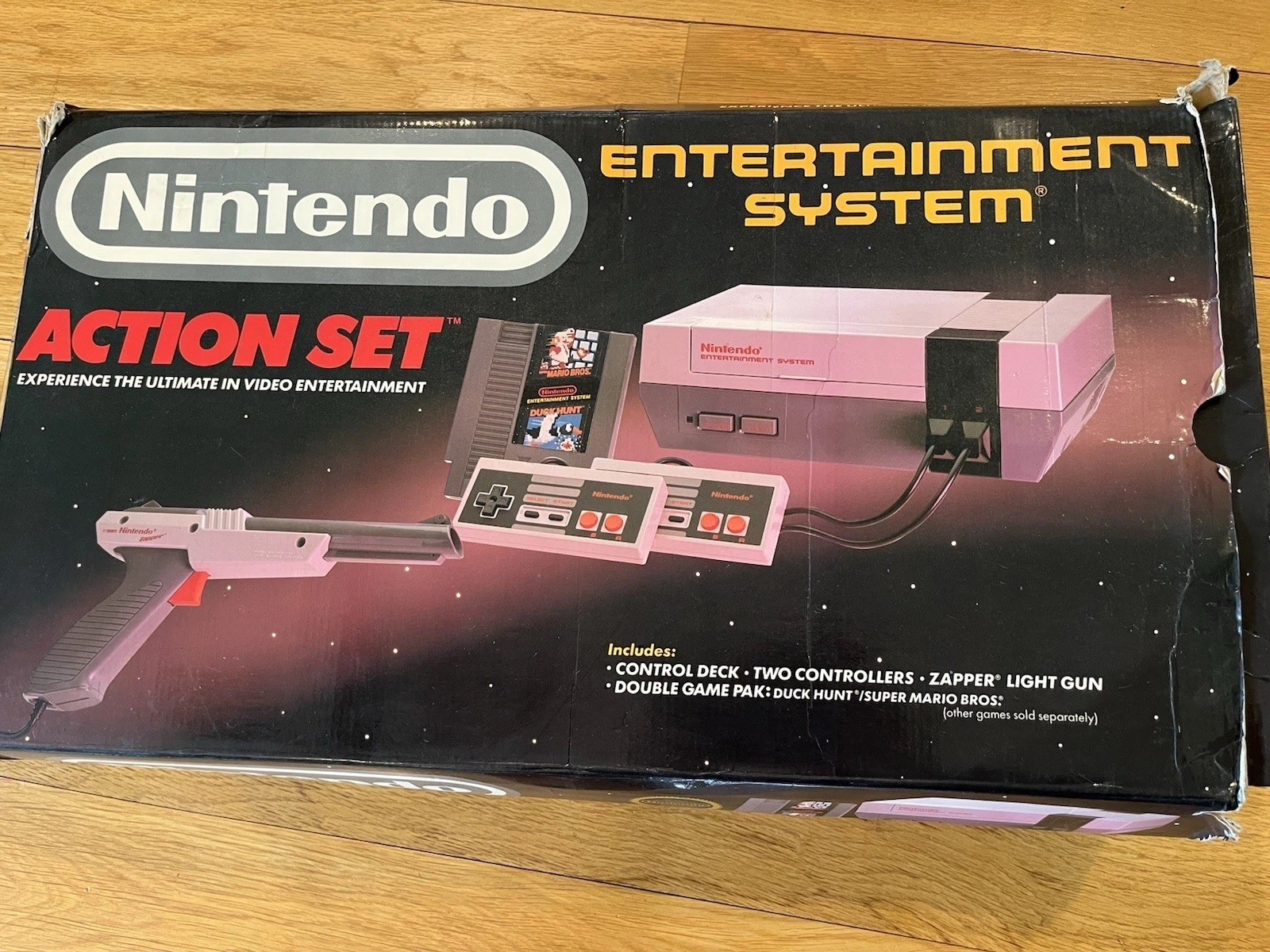 Nintendo Entertainment System With 2 Controllers, The Zapper, And 2 Books