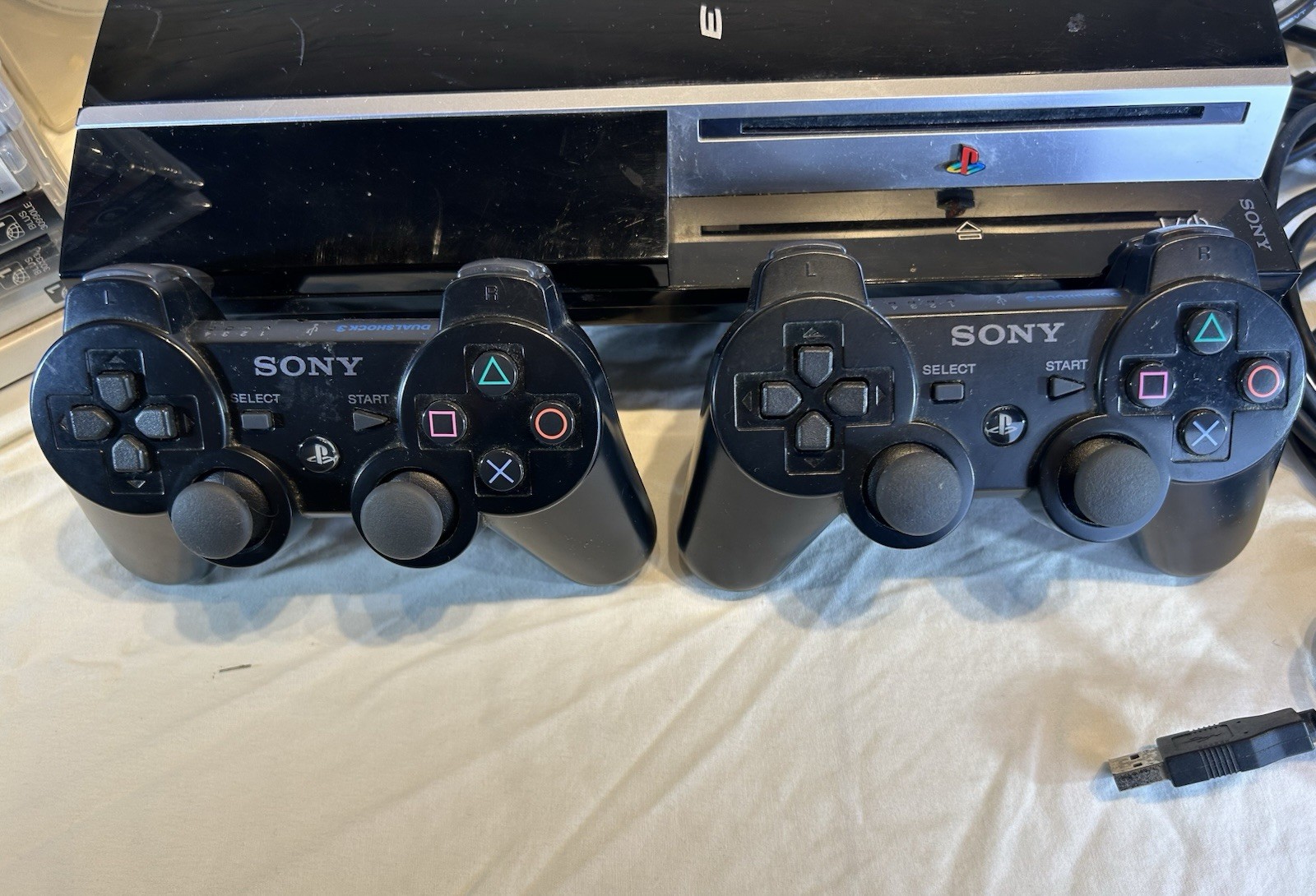 PlayStation 3 – PS3 Fat 80GB CECHL01 Console Bundle w/ 2 Controllers & 19 Games