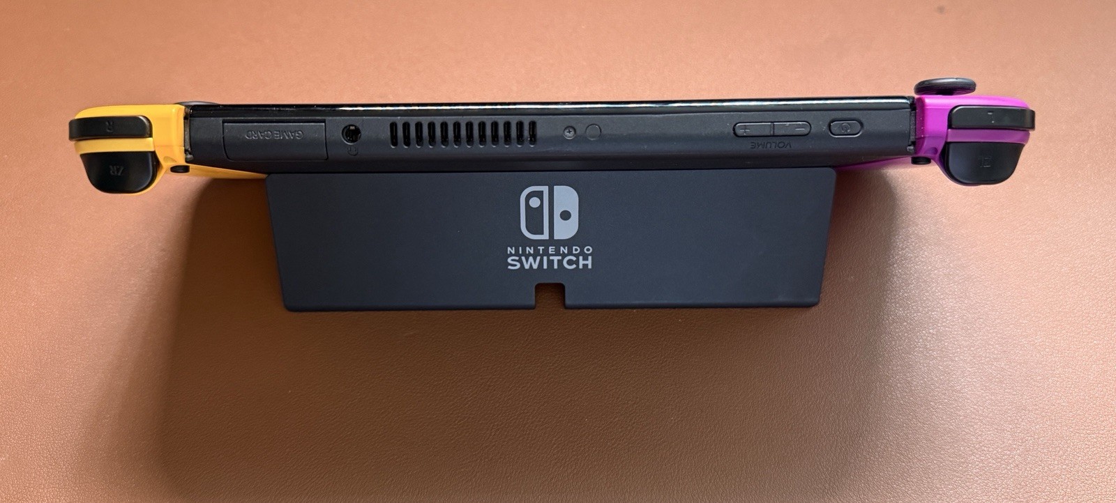 Nintendo Switch OLED Bundle Neon Purple Orange Joy-Con 512GB SD + Grip and Case