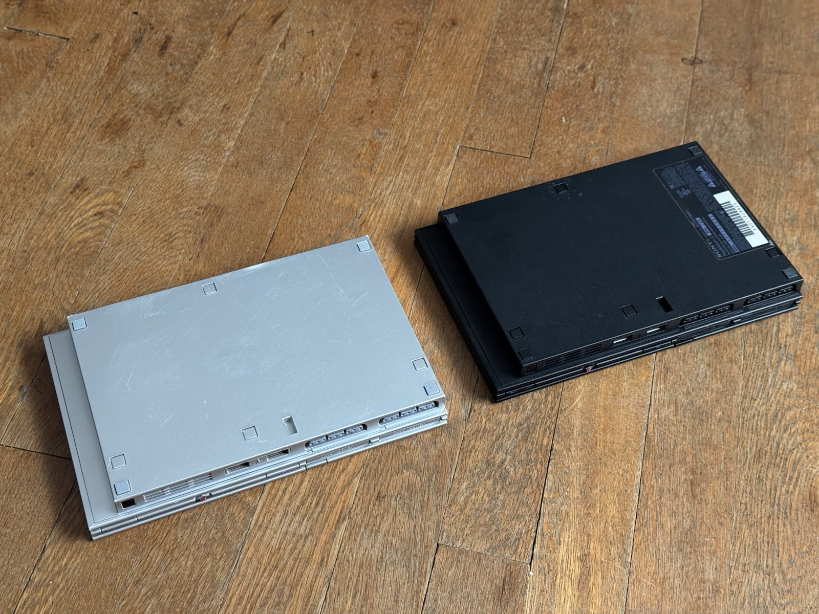 Lot of two Sony Playstation 2 Slim Consoles PARTS OR REPAIR