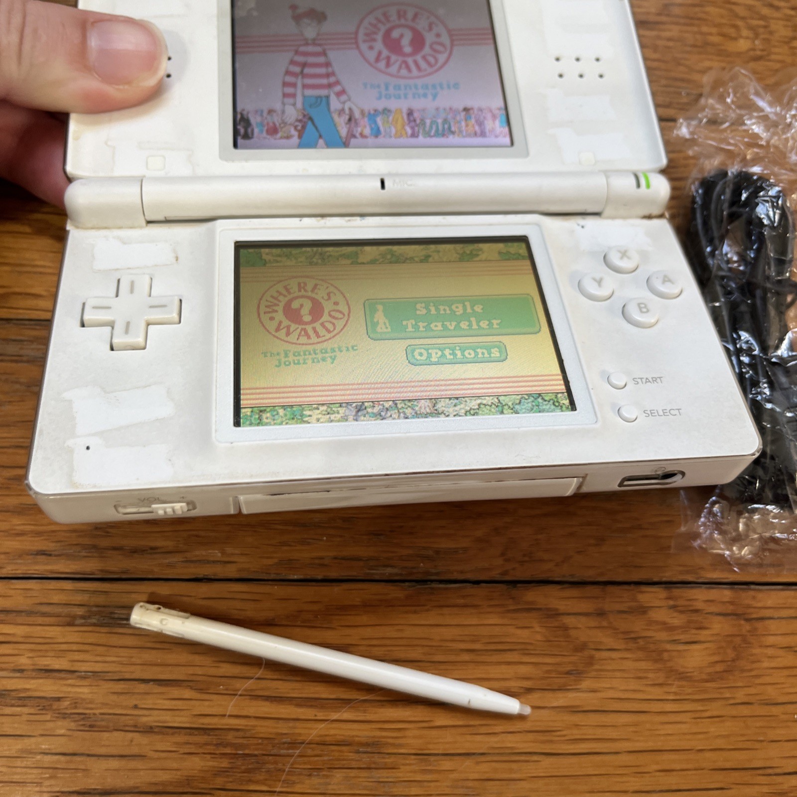 Nintendo DS Lite Handheld Console – Polar White and game charger stylus works