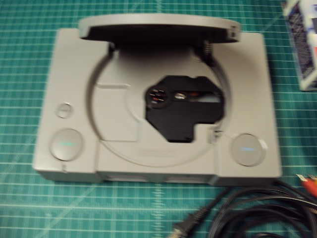 Sony Playstation 1 console bundle with 6 games .