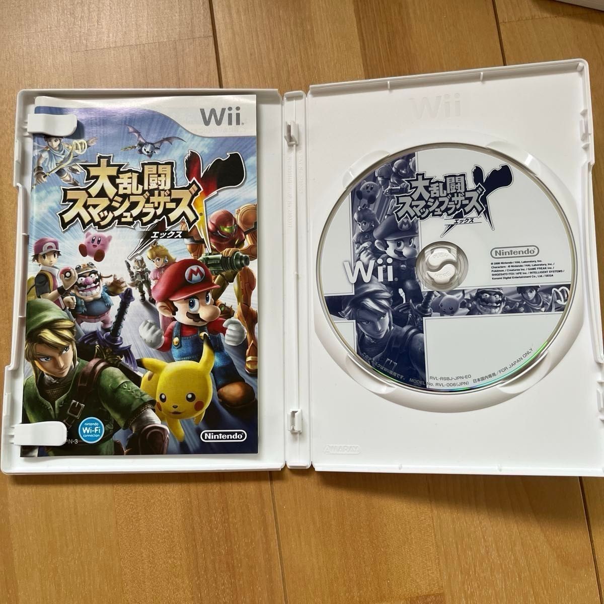 Nintendo Wii console with Wii Party bundle, Nunchuk included, and 3 other games.