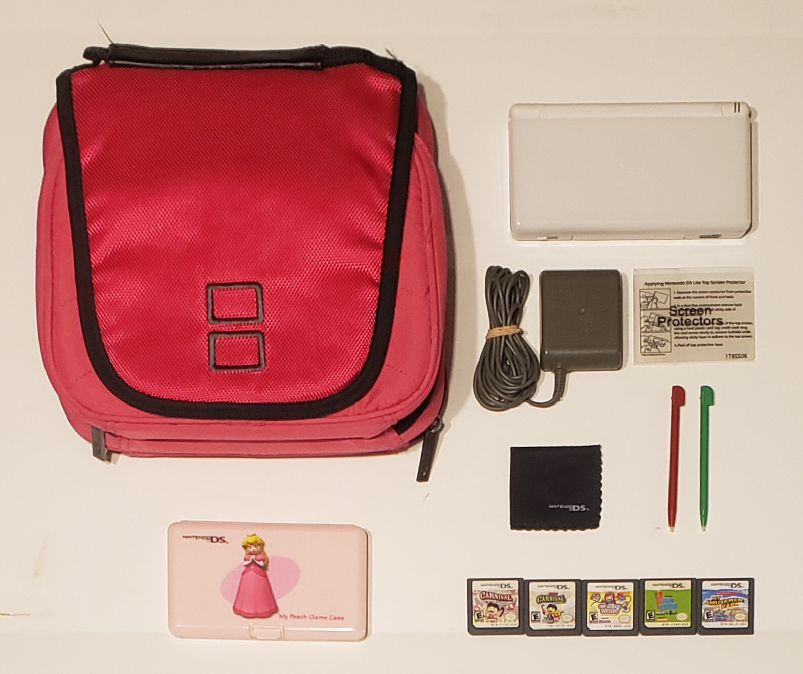 Nintendo DS lite WHITE Console C/USG-USA-1 w/5 Games+Case+Charger+Extras!