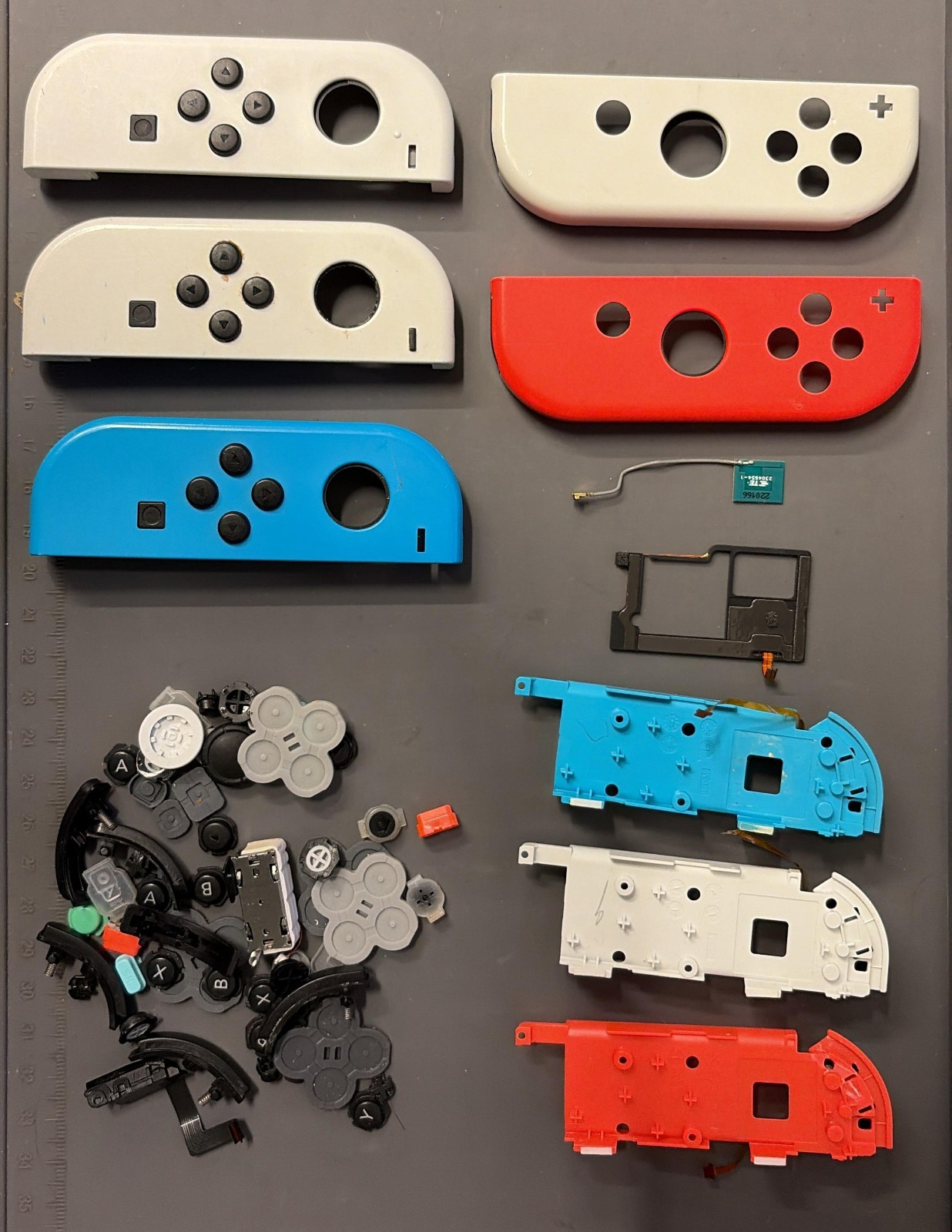 Lot of Random Switch Joycon Parts Shells, Mainboard, Buttons Etc Triggers