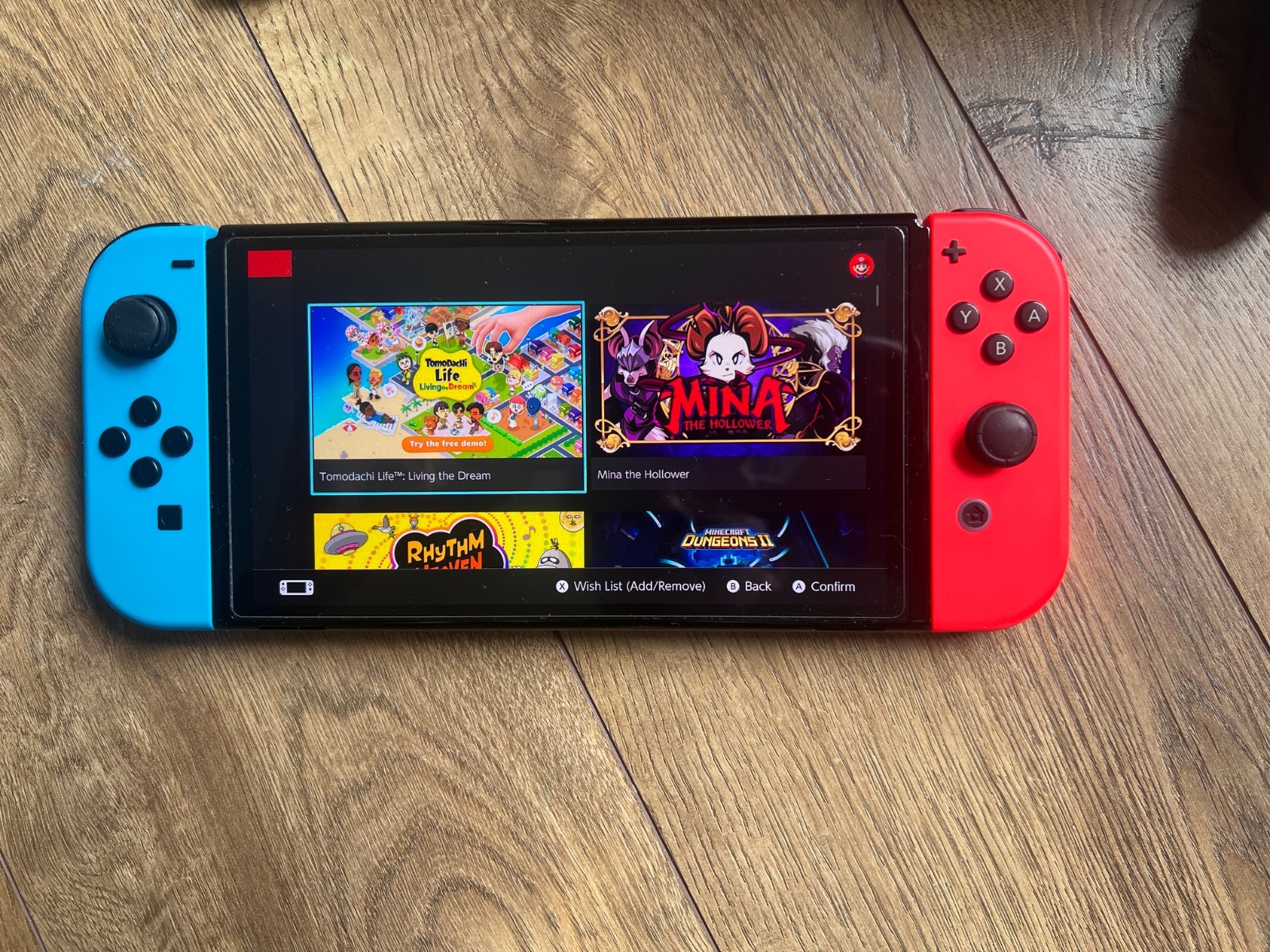 Nintendo Switch OLED Handheld Console – 64GB – Black/Neon Red/Neon