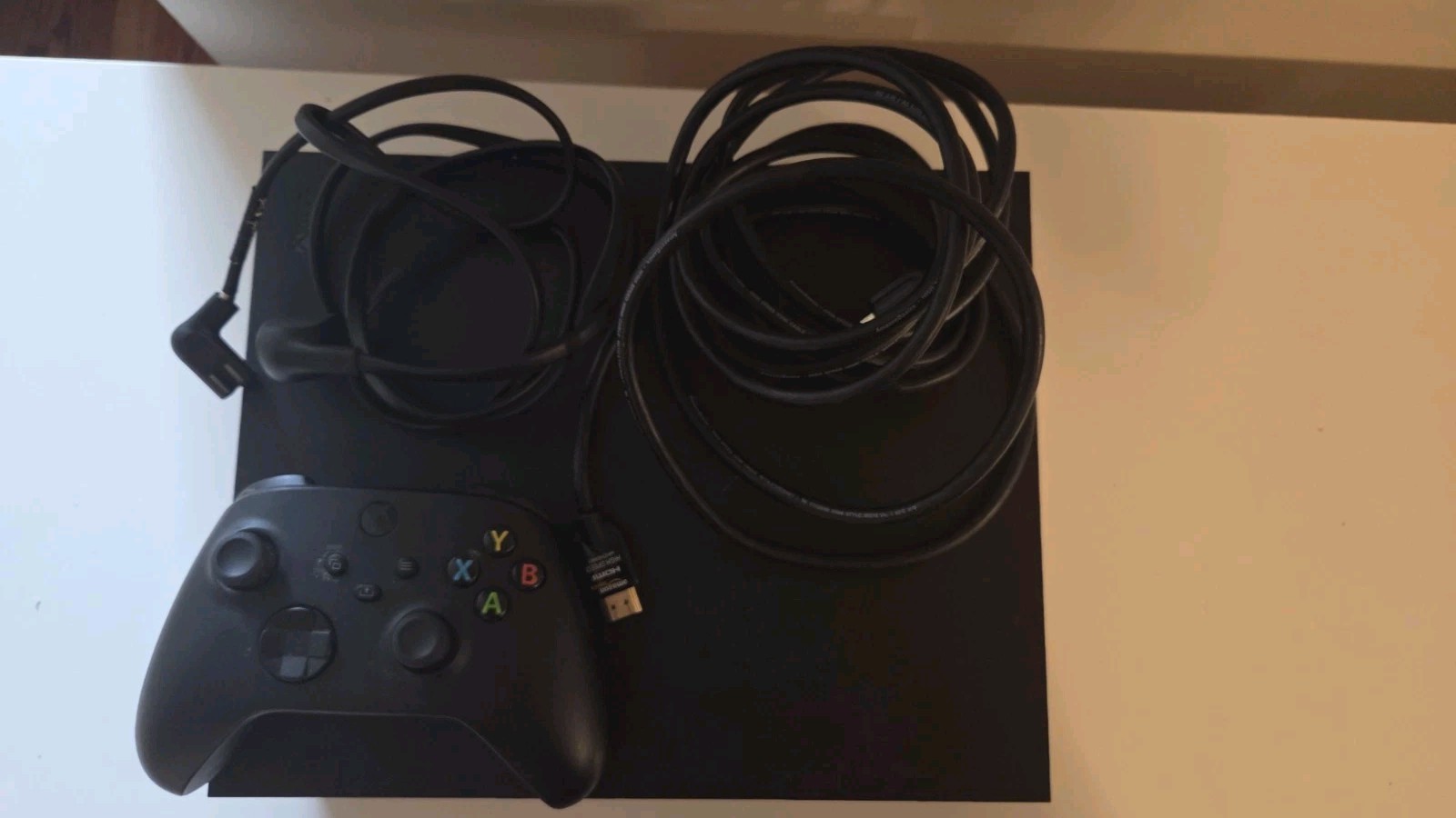 Microsoft Xbox One X 1TB Console – Black with controller, HDMI, and power cable