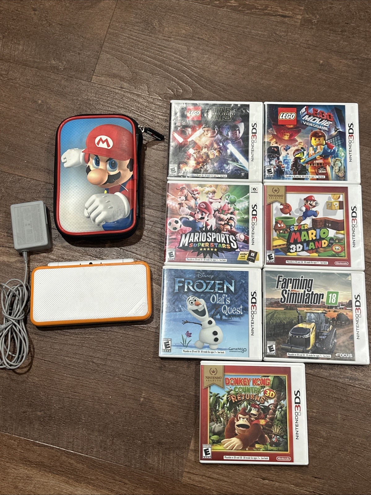 Nintendo “New” 2DS XL Handheld Console – White/Orange – Tested – Case & 7 Games
