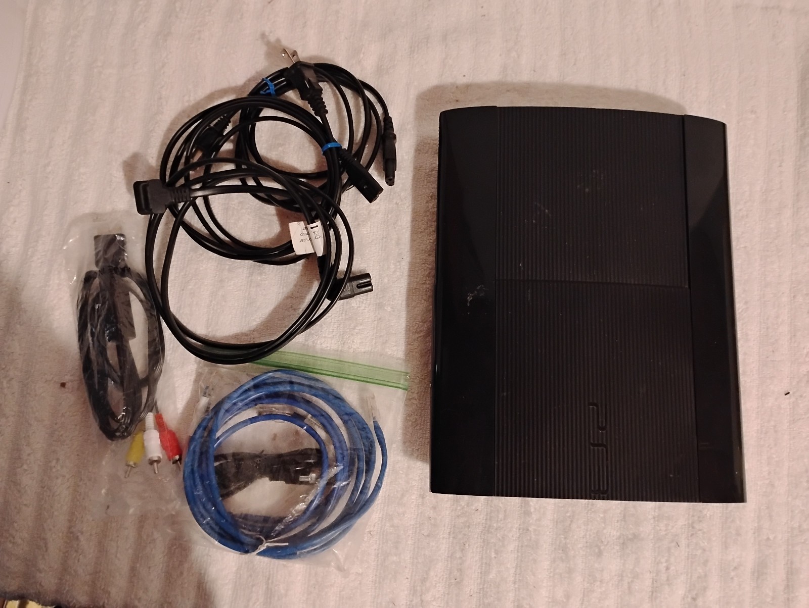 Sony PlayStation 3 Super Slim – 500 GB – Black Console with cords