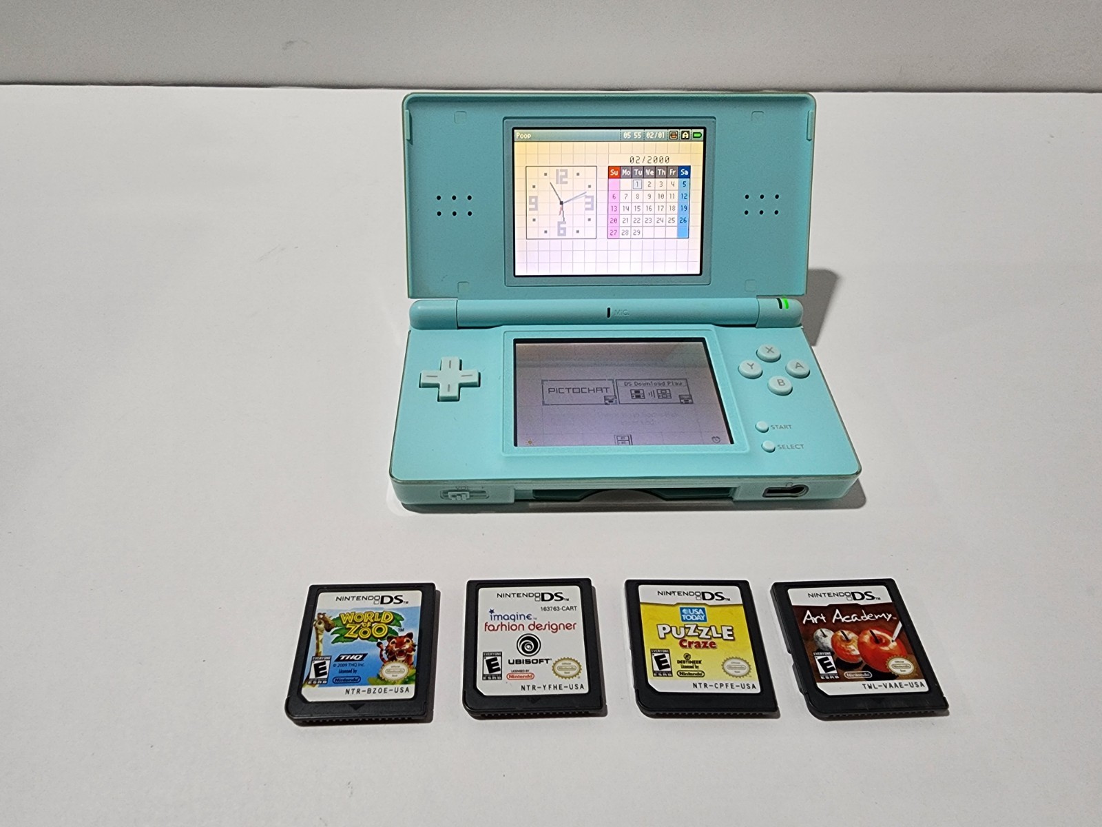 Nintendo DS Lite Handheld Console – Ice Blue with 4 Games