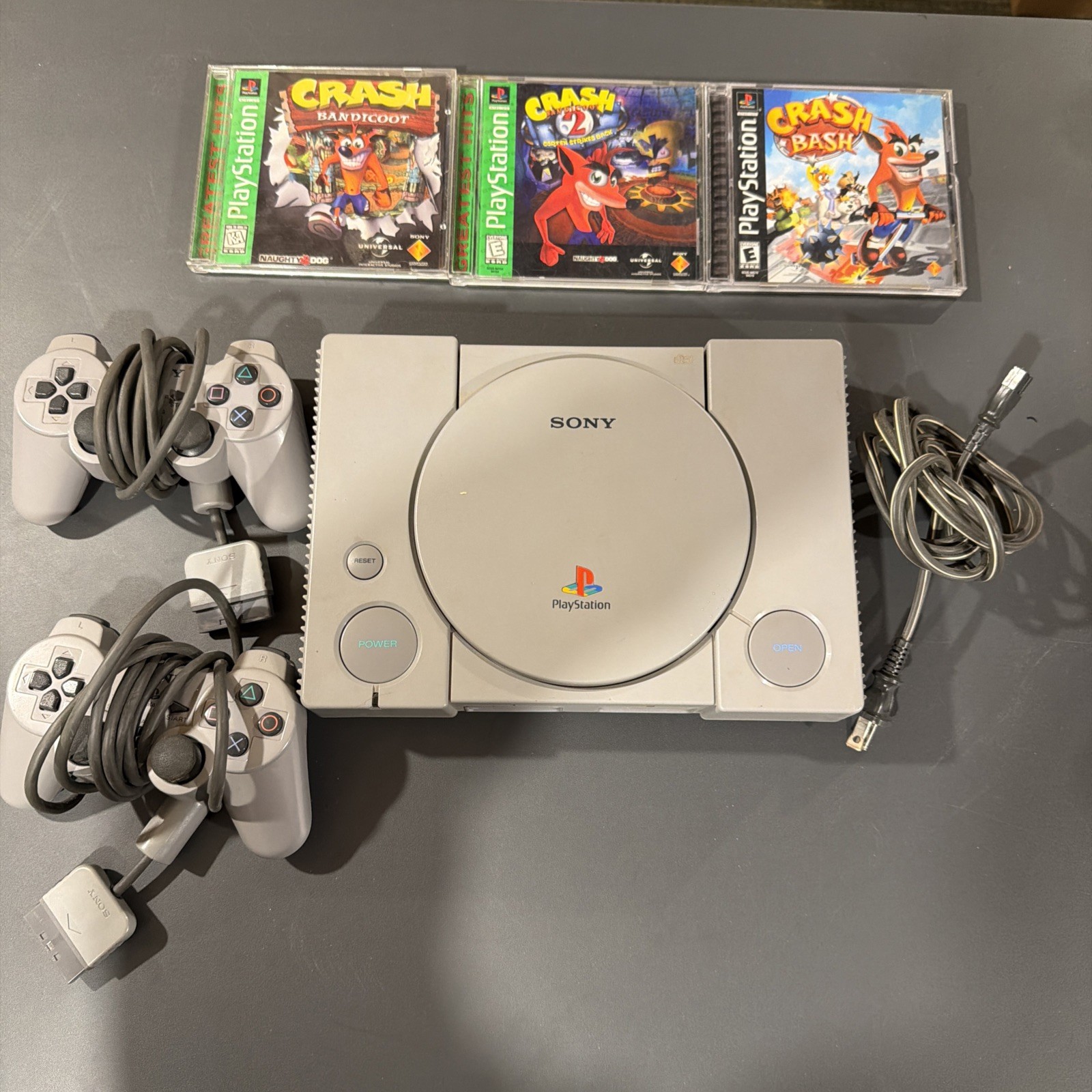 PlayStation 1 Console With Power cord 2 Controllers & 4 Crash Bandicoot Games