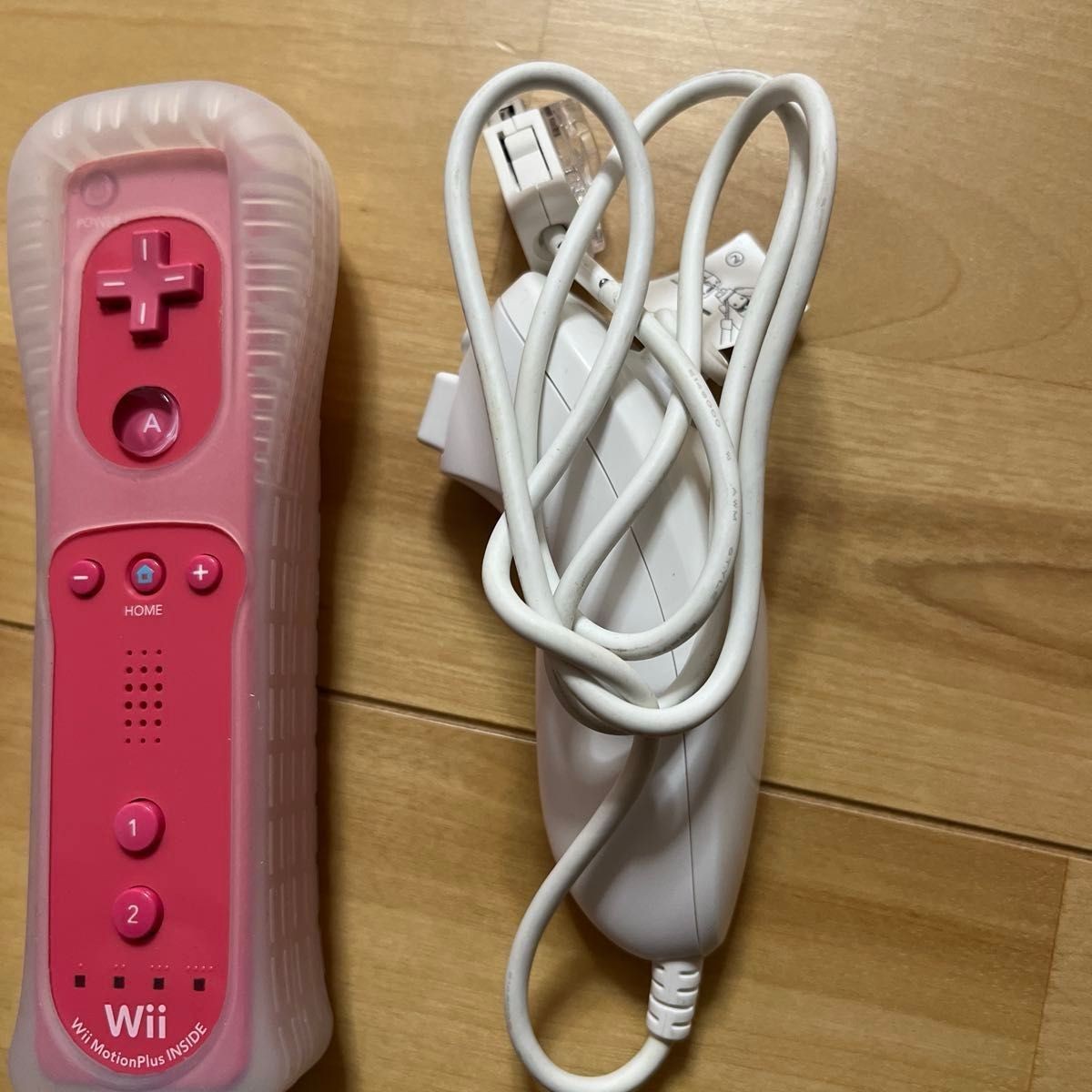 Nintendo Wii console with Wii Party bundle, Nunchuk included, and 3 other games.