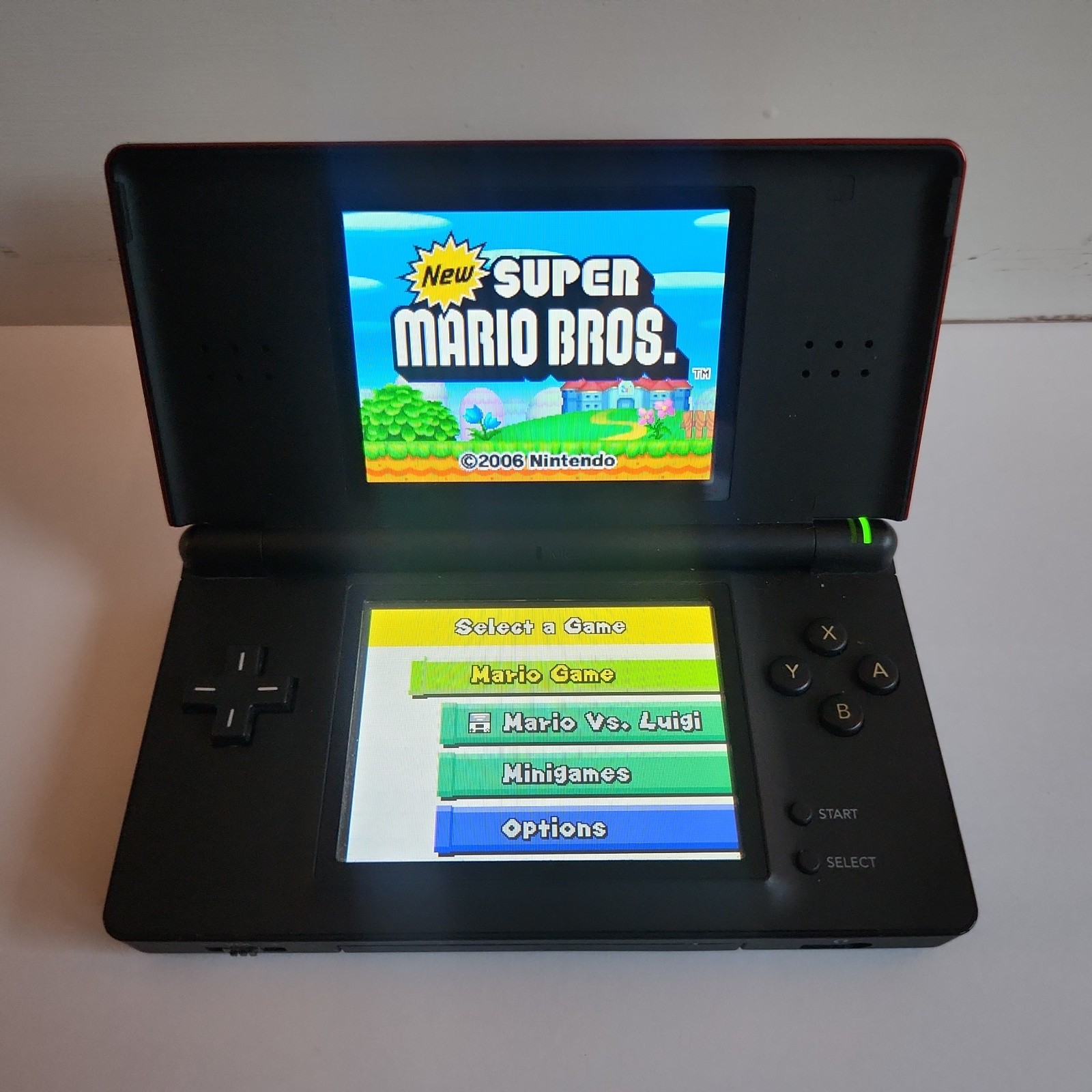 Nintendo DS Lite Red/Black boxed /w insert, manuals and accessories – Aust model