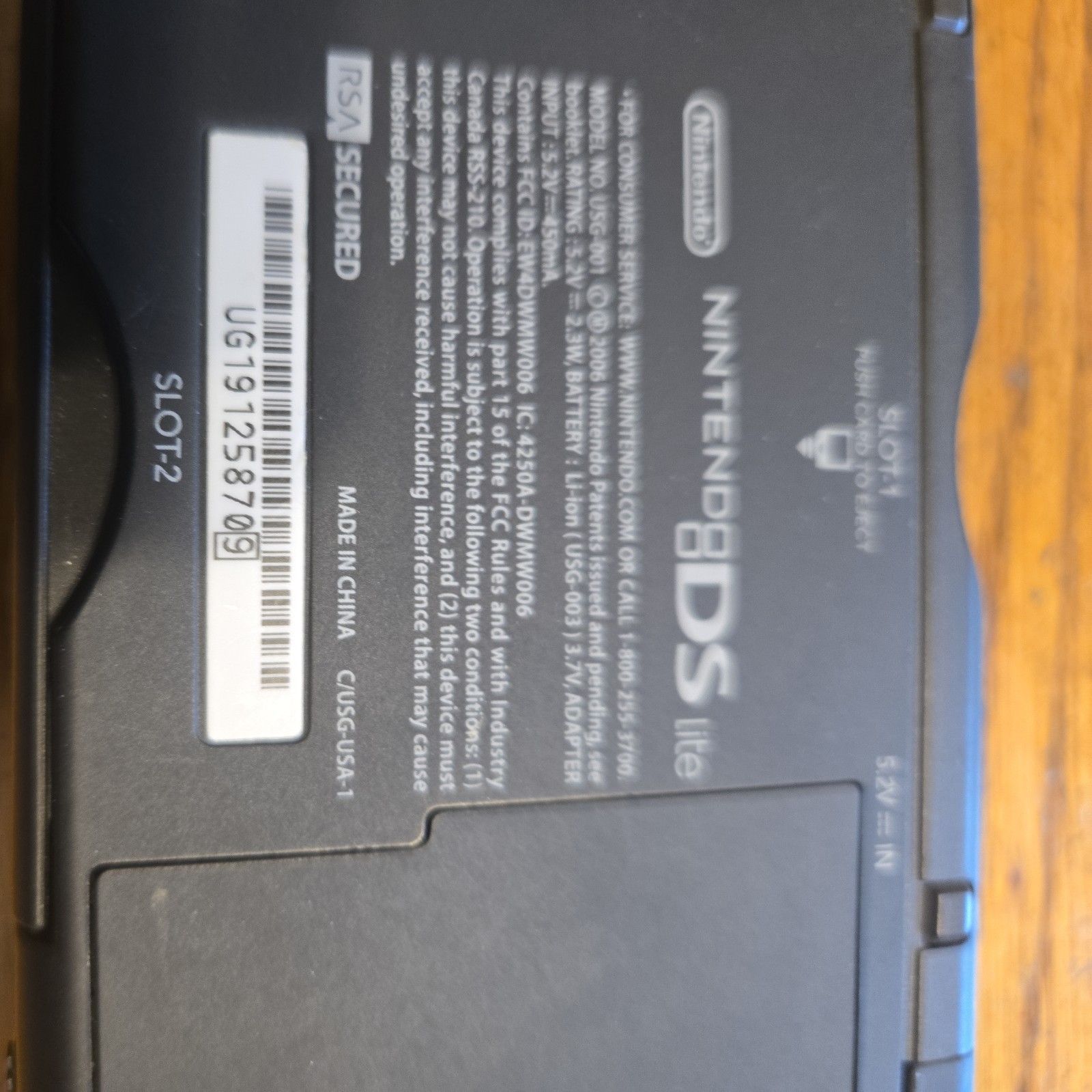 Nintendo DS Lite Bundle (Charger, 8 Games, extra stylus, & Nintendo case