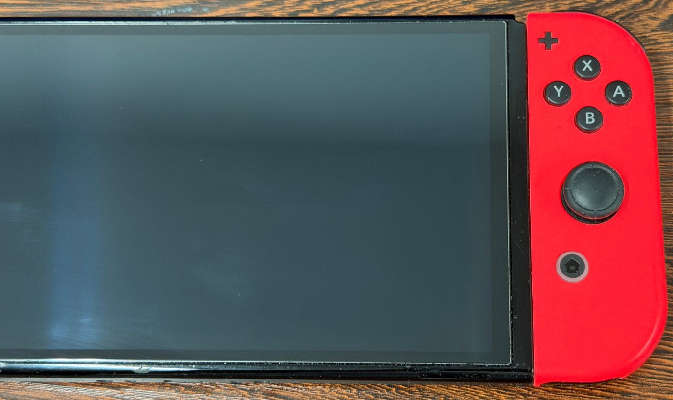 Nintendo Switch OLED Model 64GB Neon Red White Joycons – Good Used Condition