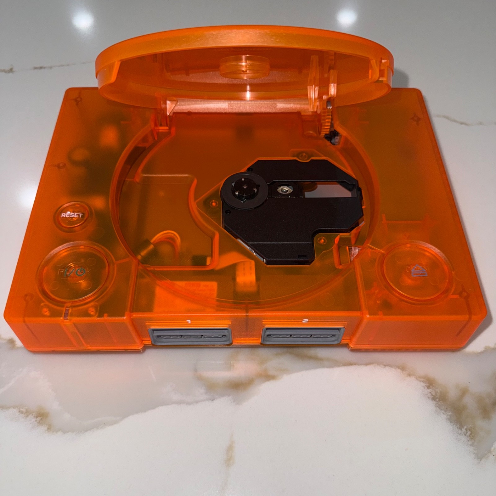 Sony PlayStation 1 Console (SCPH-5501) Bundle – Transparent Orange Clear Shell
