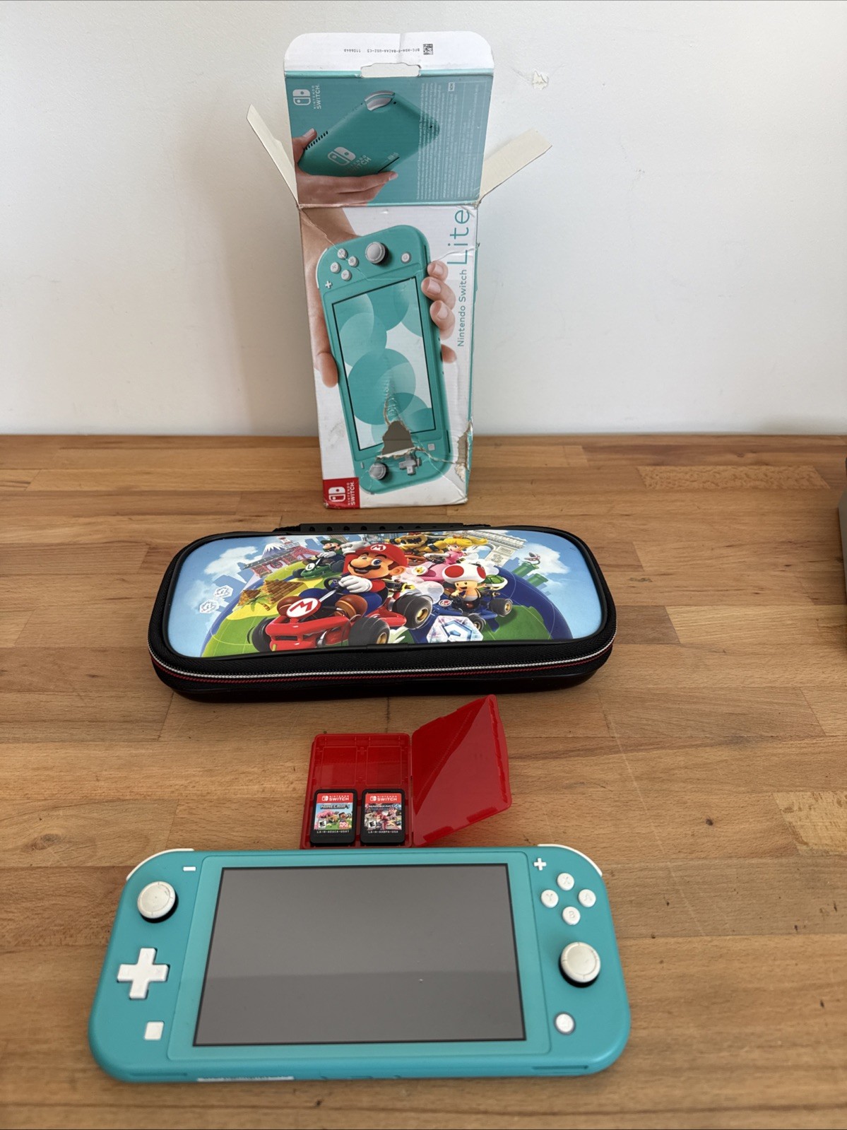 Switch Lite Turquoise Works Great Case + Mariokart Deluxe 8/Minecraft Bundle